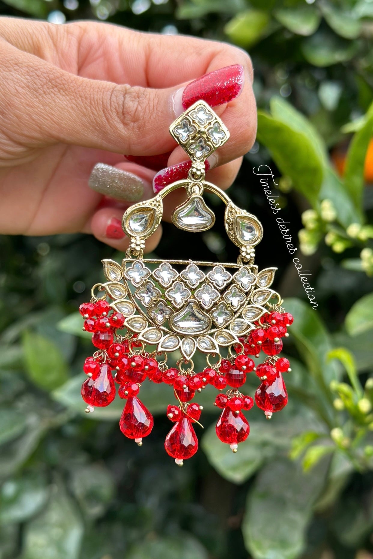 Red earrings in kundan 👌