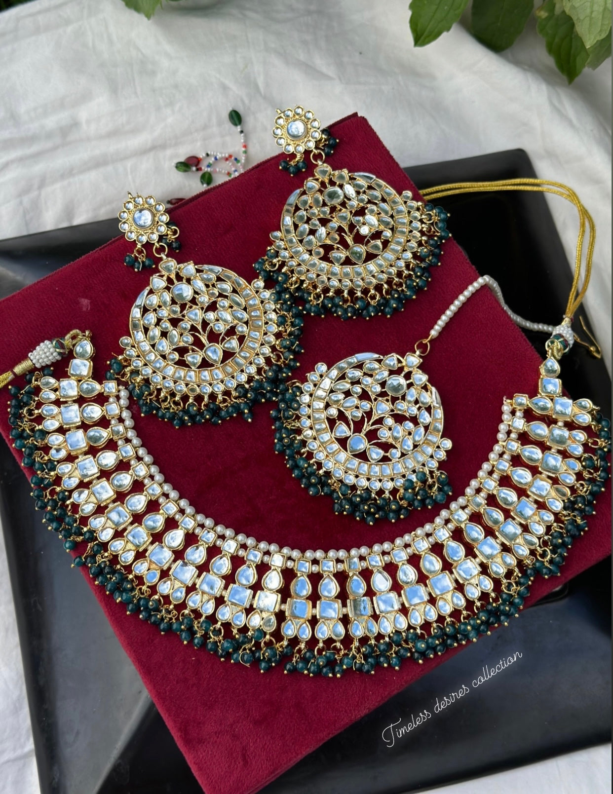 Peacock green Necklace / choker set in Kundan with oversized earrings and tikka ( high quality )