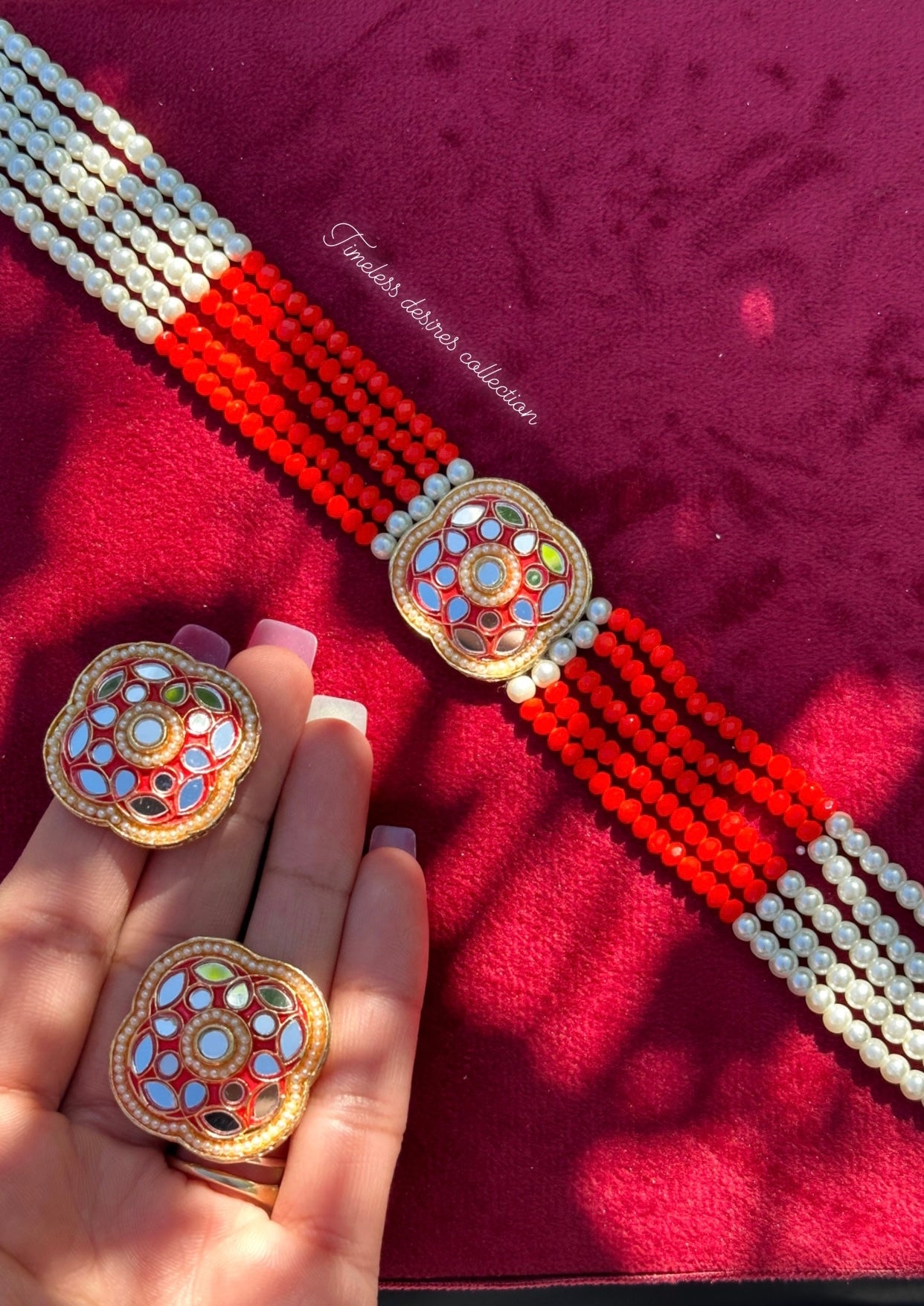 Red choker / necklace set with studs in mirror