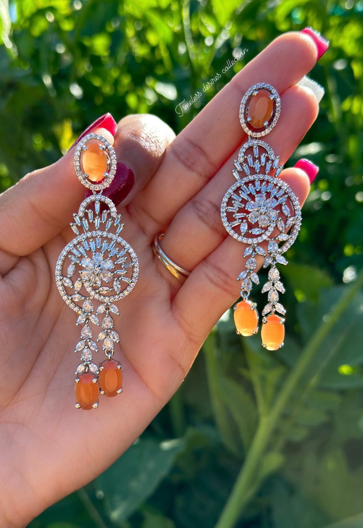 American diamond earrings ( statement PC )