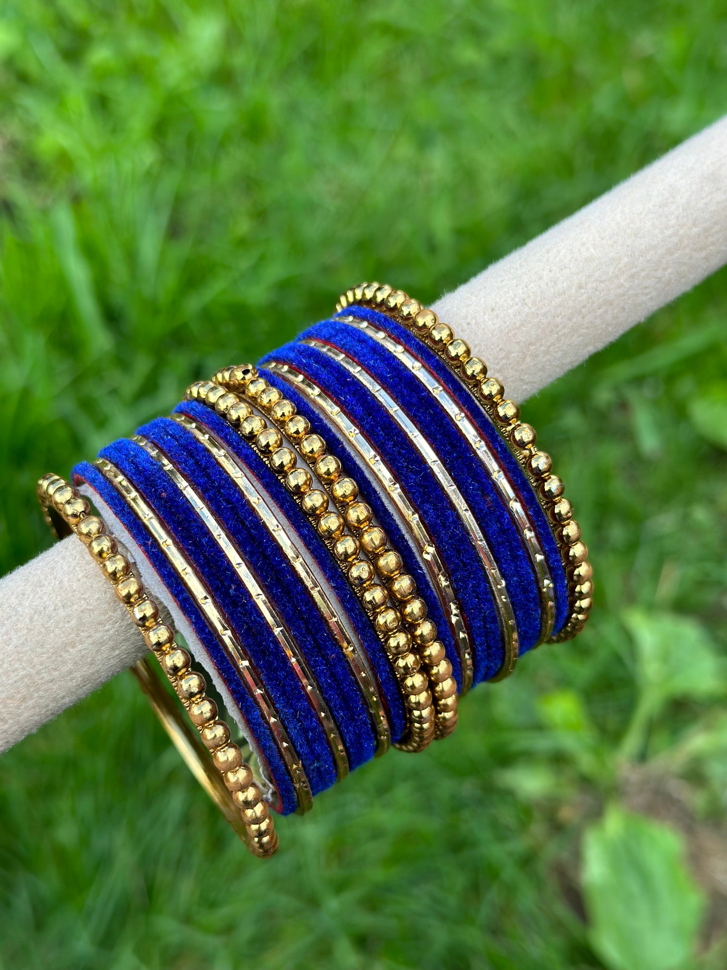 Blue velvet bangles set with golden beaded kangan’s