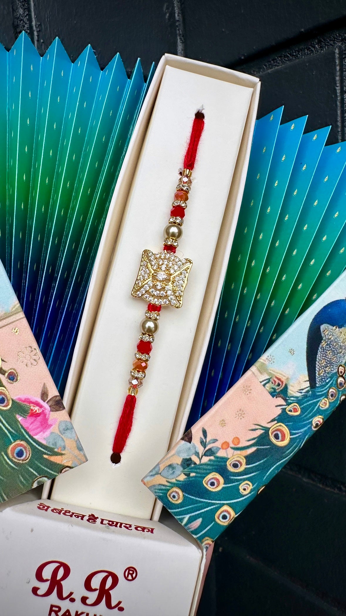 Fency Packaged American Diamon Rakhi/ Rakhdi for Brother - Code A8