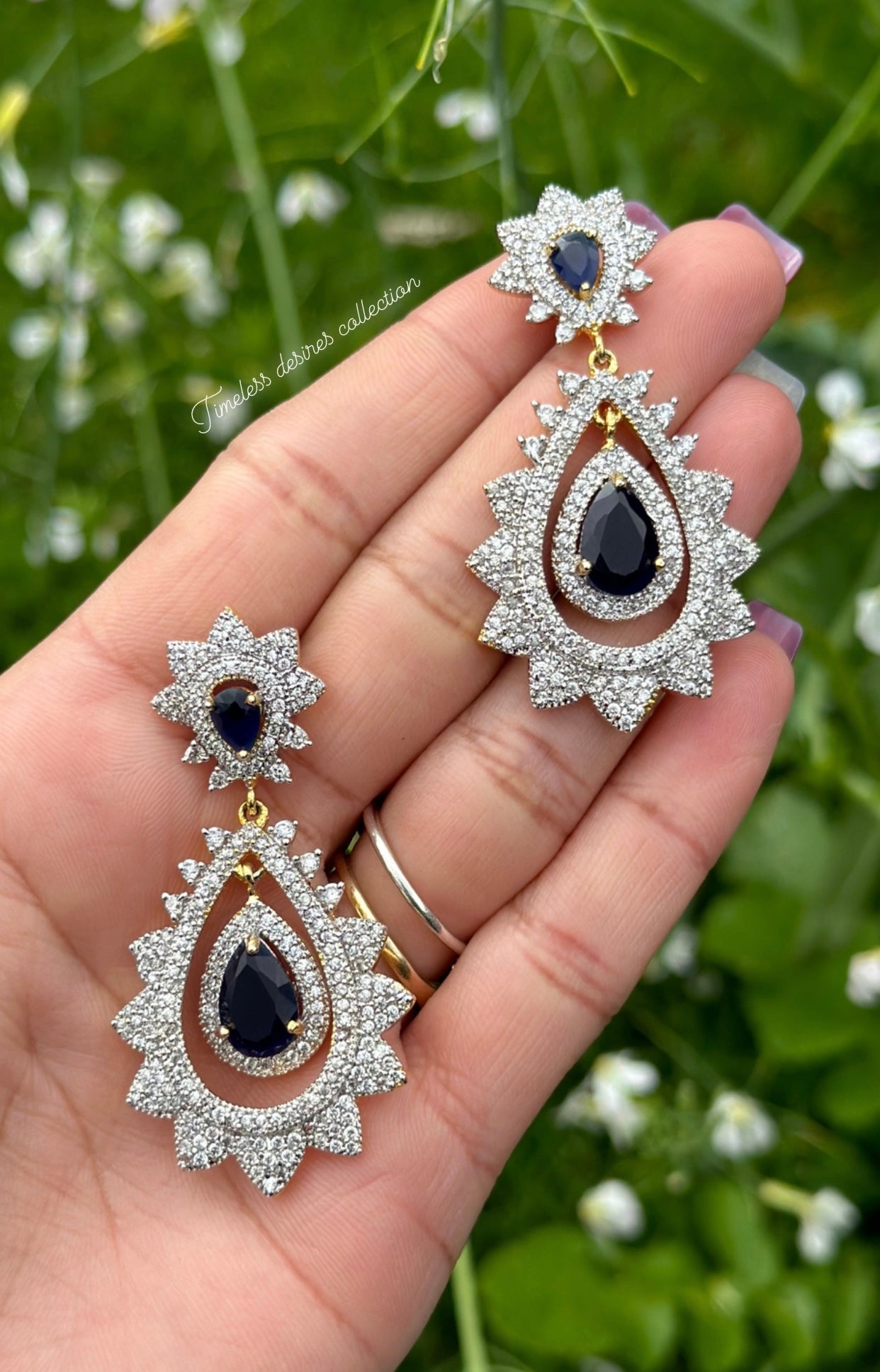Blue American diamond earrings in golden