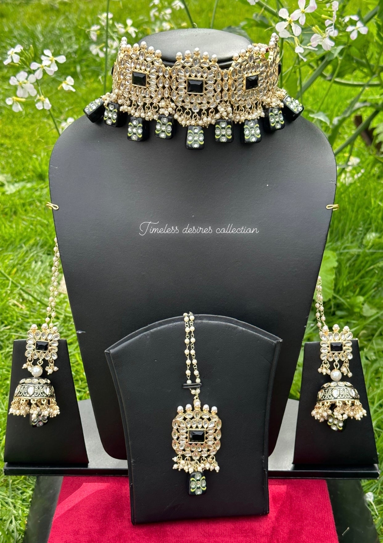 Black choker / necklace set in Kundan with tumbler beads in meenakari with Jhumka included Sahara chains