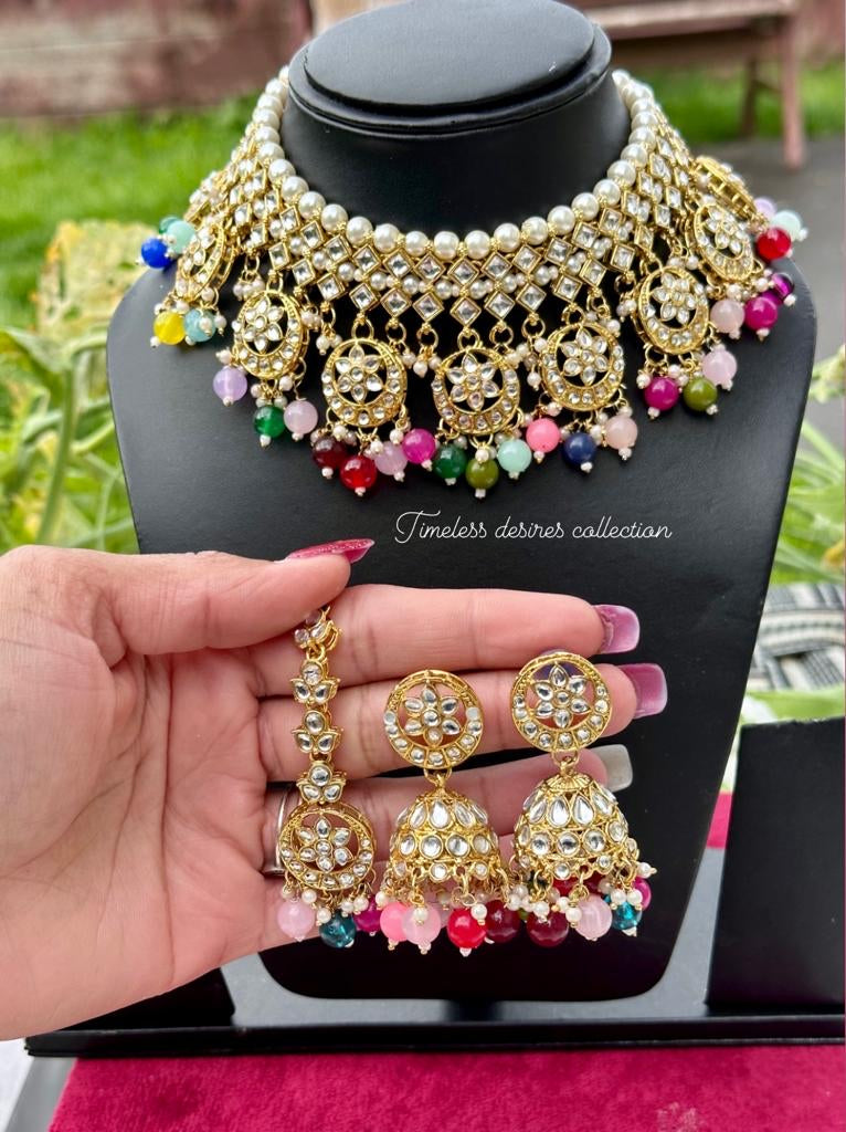 Multi colour necklace set with Jhumka earrings and tikka in kundan