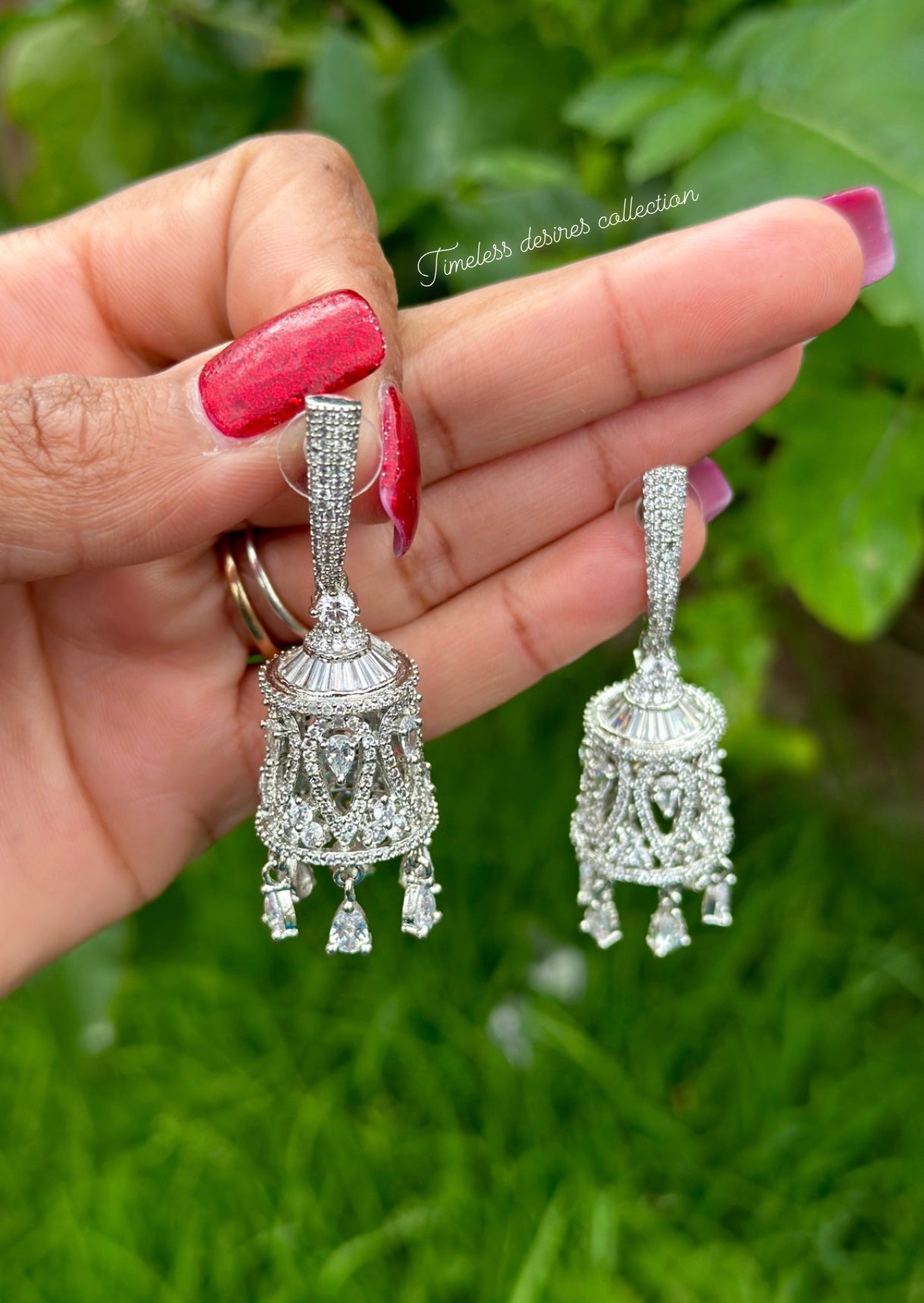 Silver American diamond Jhumka earrings
