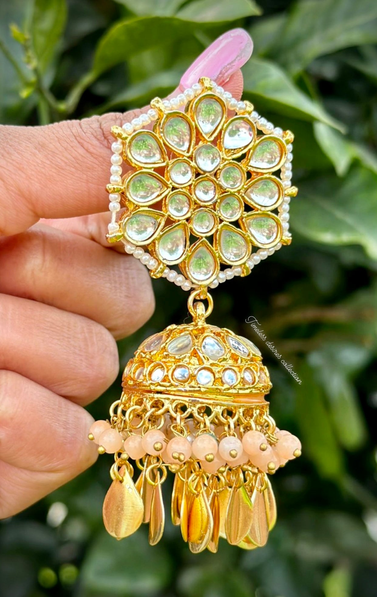 Peach Jhumka earrings in Kundan with Pipal Patti
