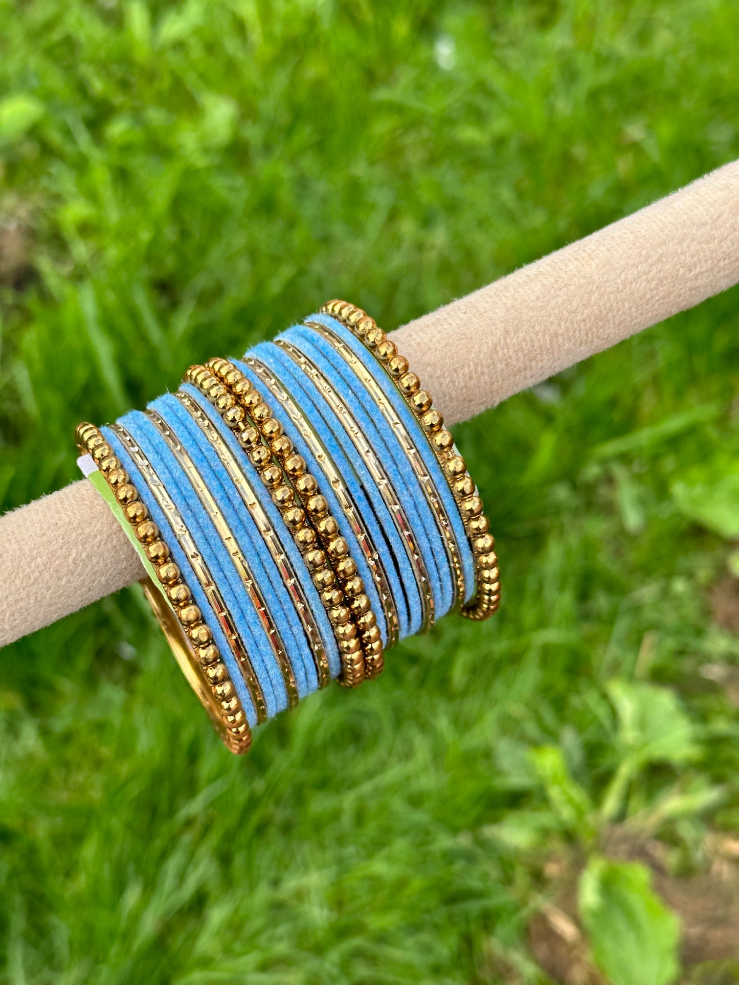 Baby Blue velvet bangles set with golden beaded kangan’s