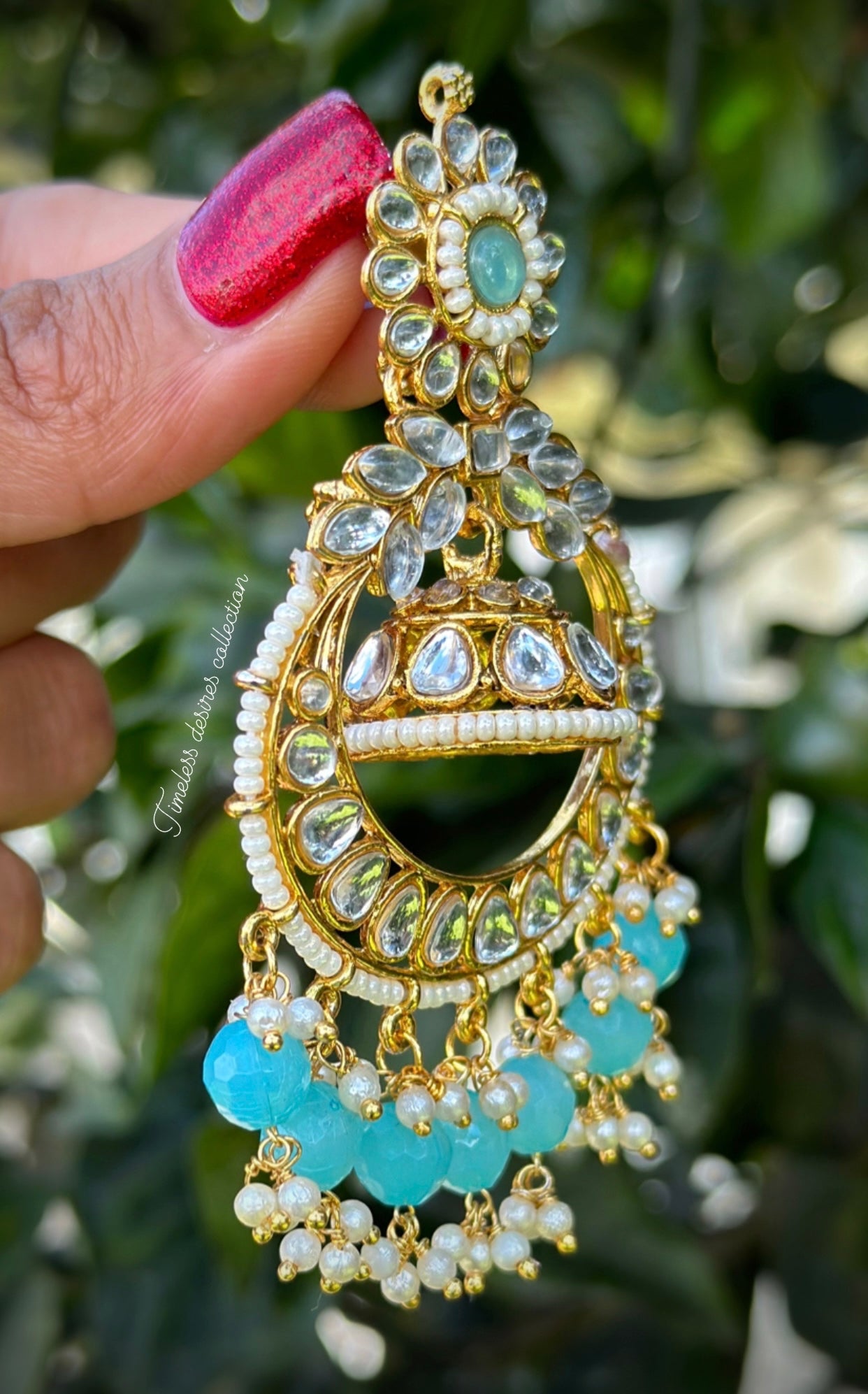 Sky blue Jhumka drop earrings in Kundan