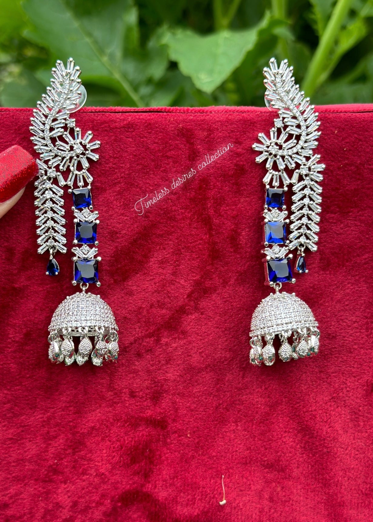 Blue long American diamond Jhumka earrings in silver