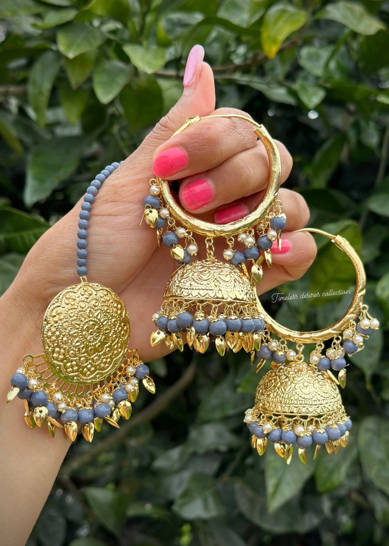 Grey Jhumka waliya earrings with Tikka in pipal patti in traditional jewellery