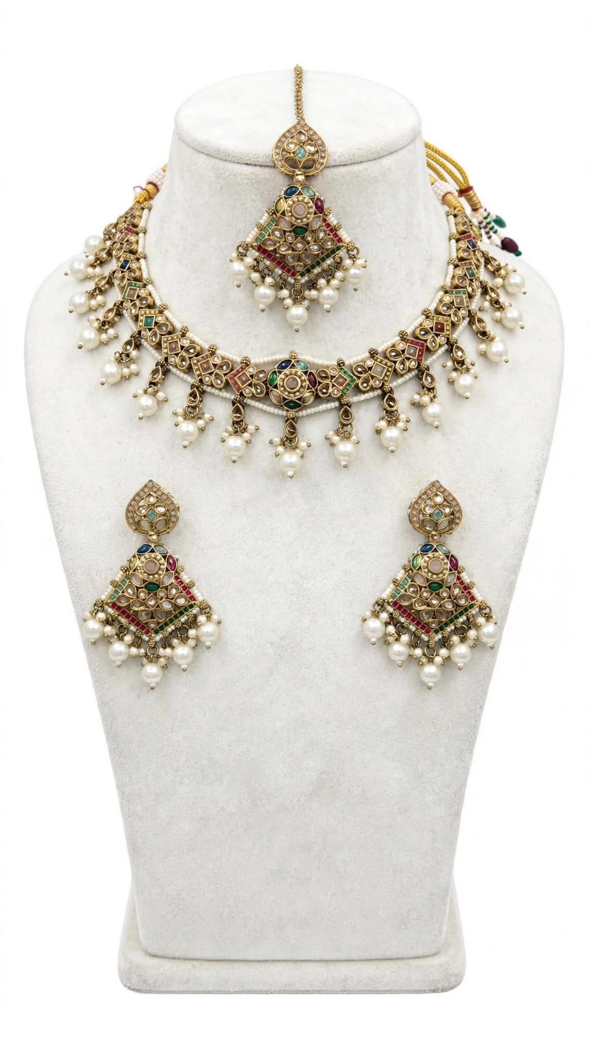 Necklace set with earrings and tikka