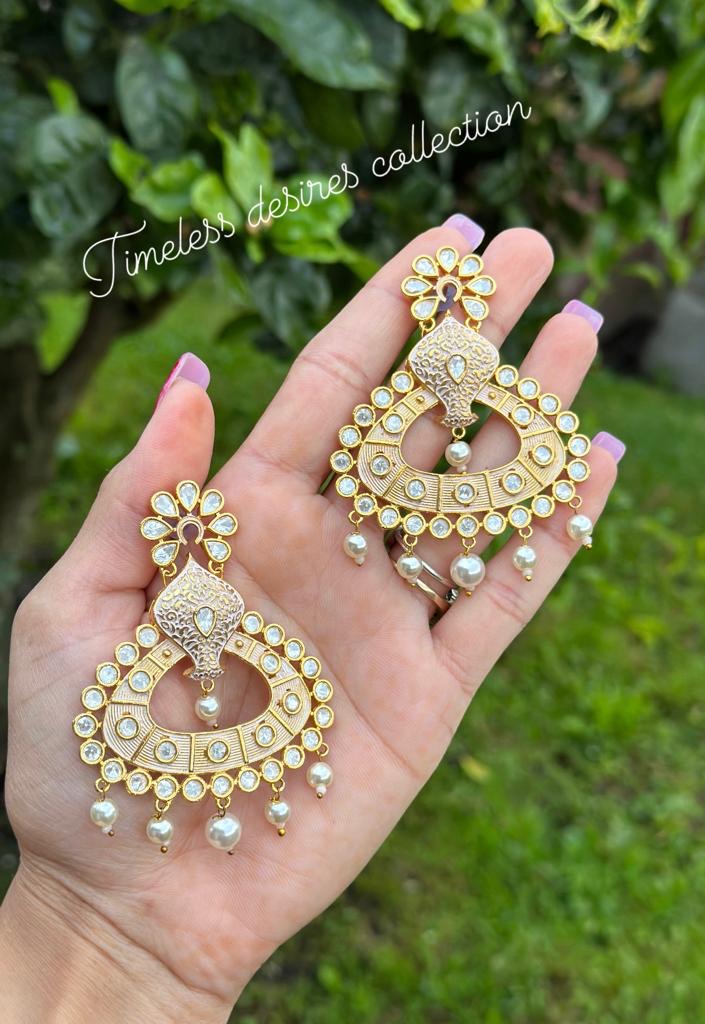 Stunning Tiyani Kundan Gold Plated earrings in peachy golden