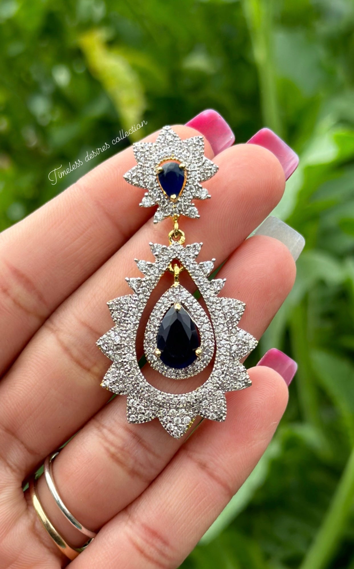 Blue American diamond earrings in golden