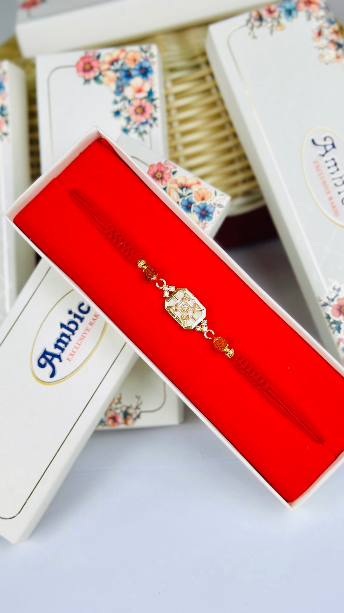 Mother of Pearl with Rudraksh Rakhi / Rakhdi Pack in American Diamond - Code A32