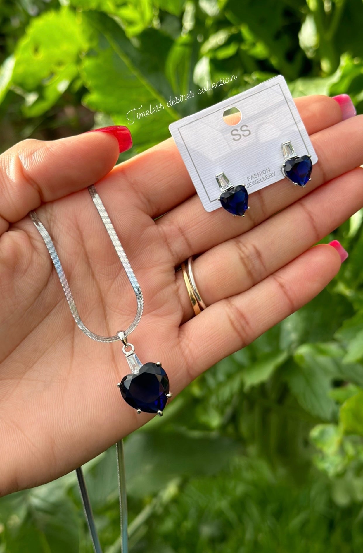 Blue American diamond necklace set with earrings in silver polish
