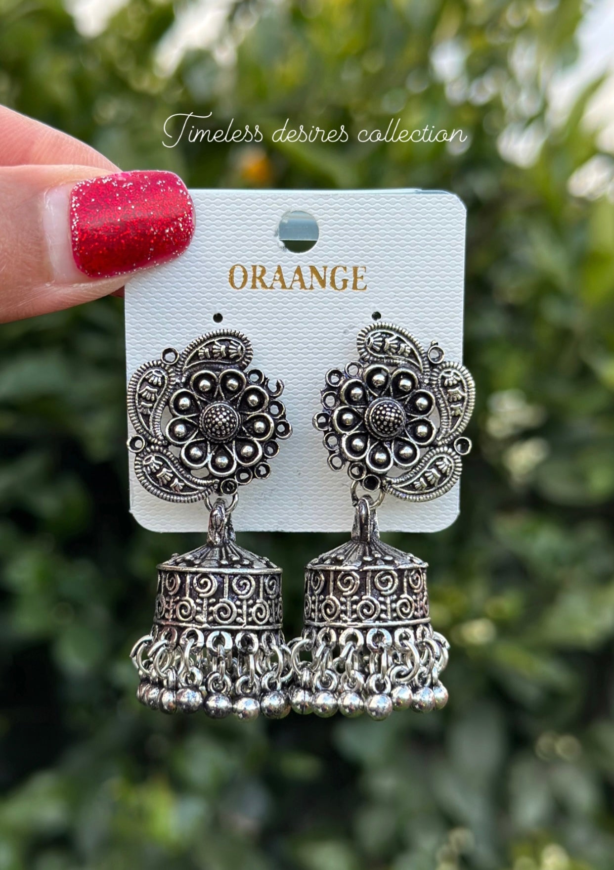 Silver look jhumka earrings in oxidised