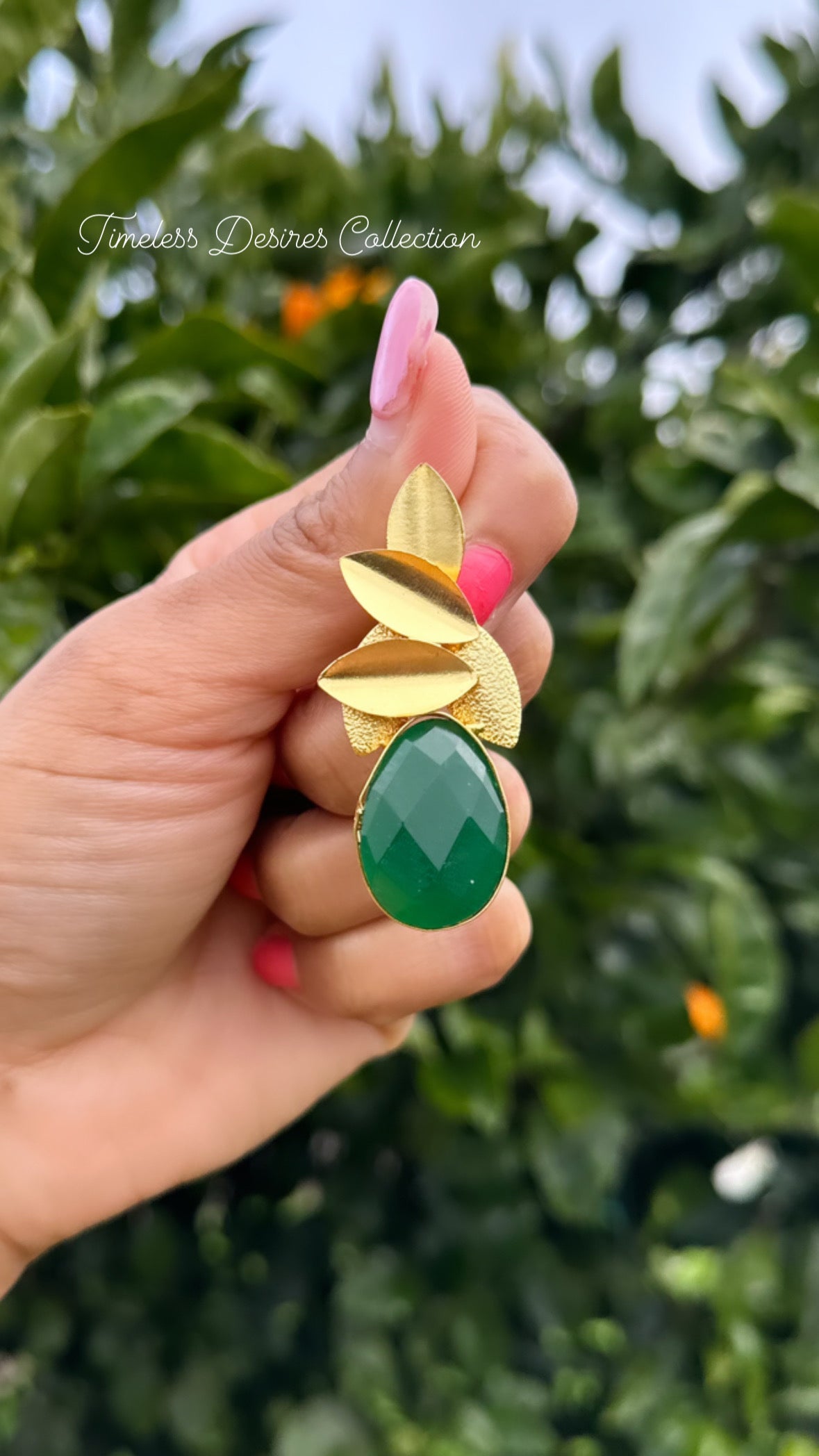 Green western style earrings in gold plating