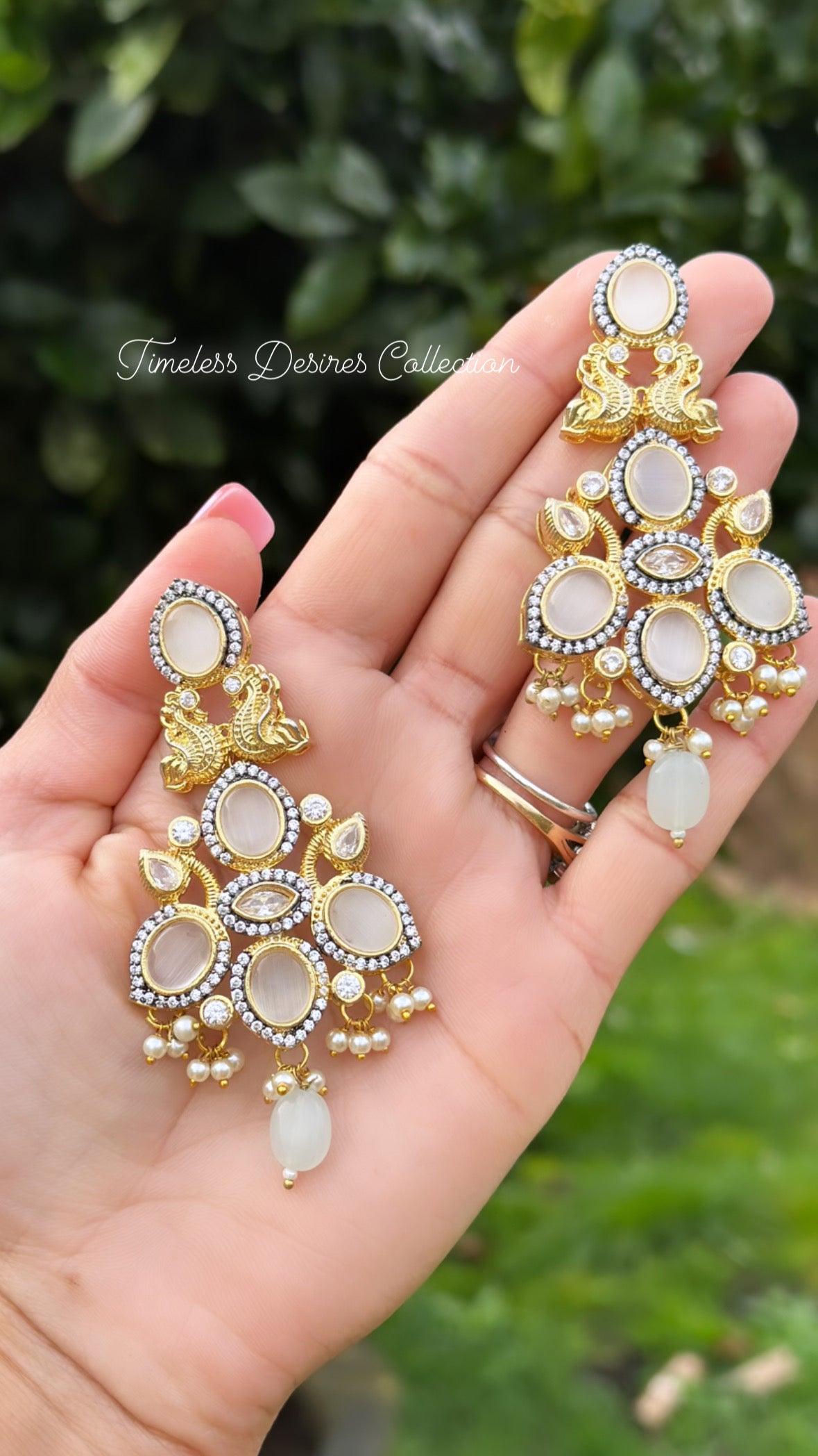 Golden and White statement earrings with Monalisa stones in Gold plating