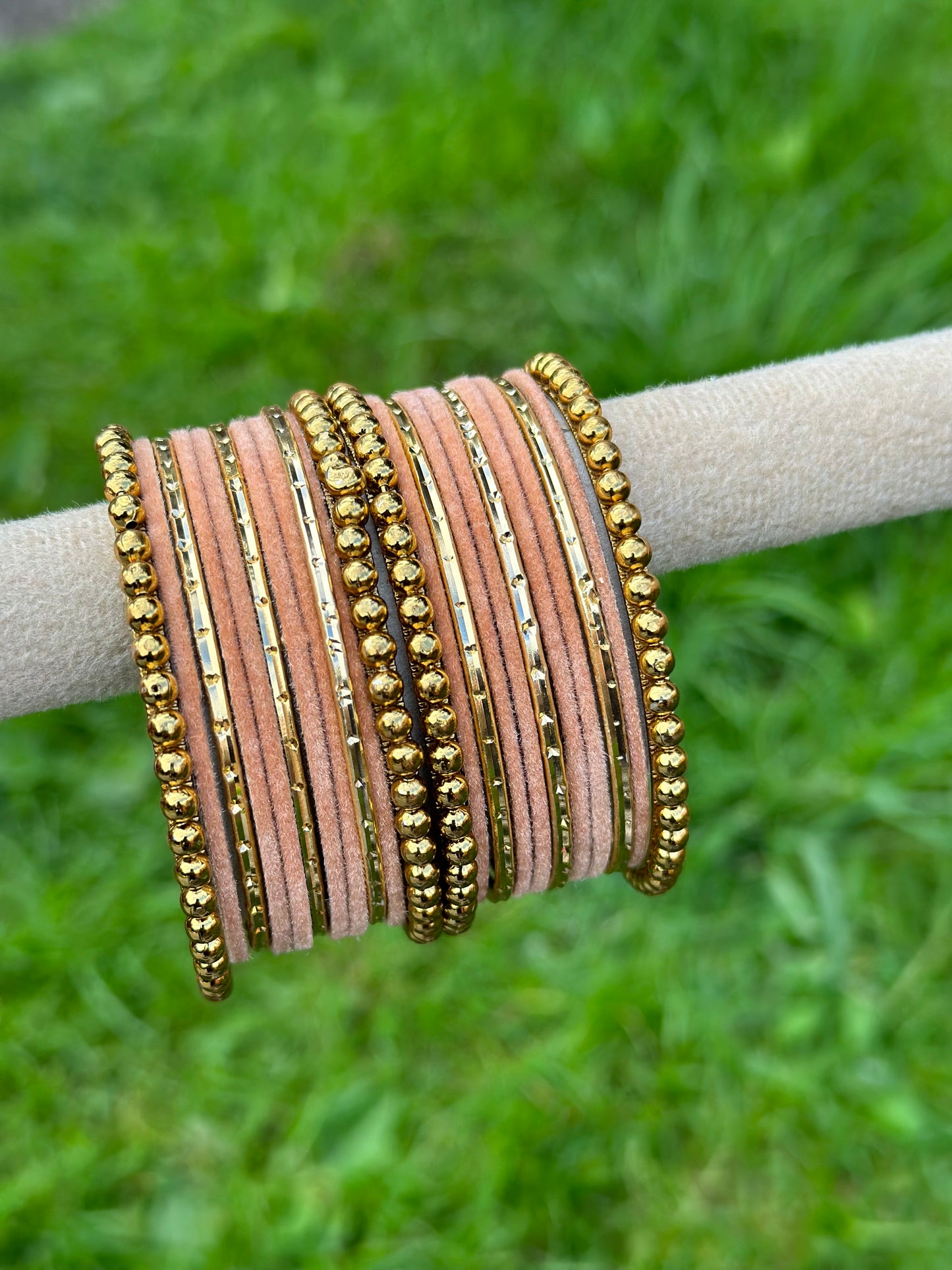 Peach velvet bangles set with golden beaded kangan’s