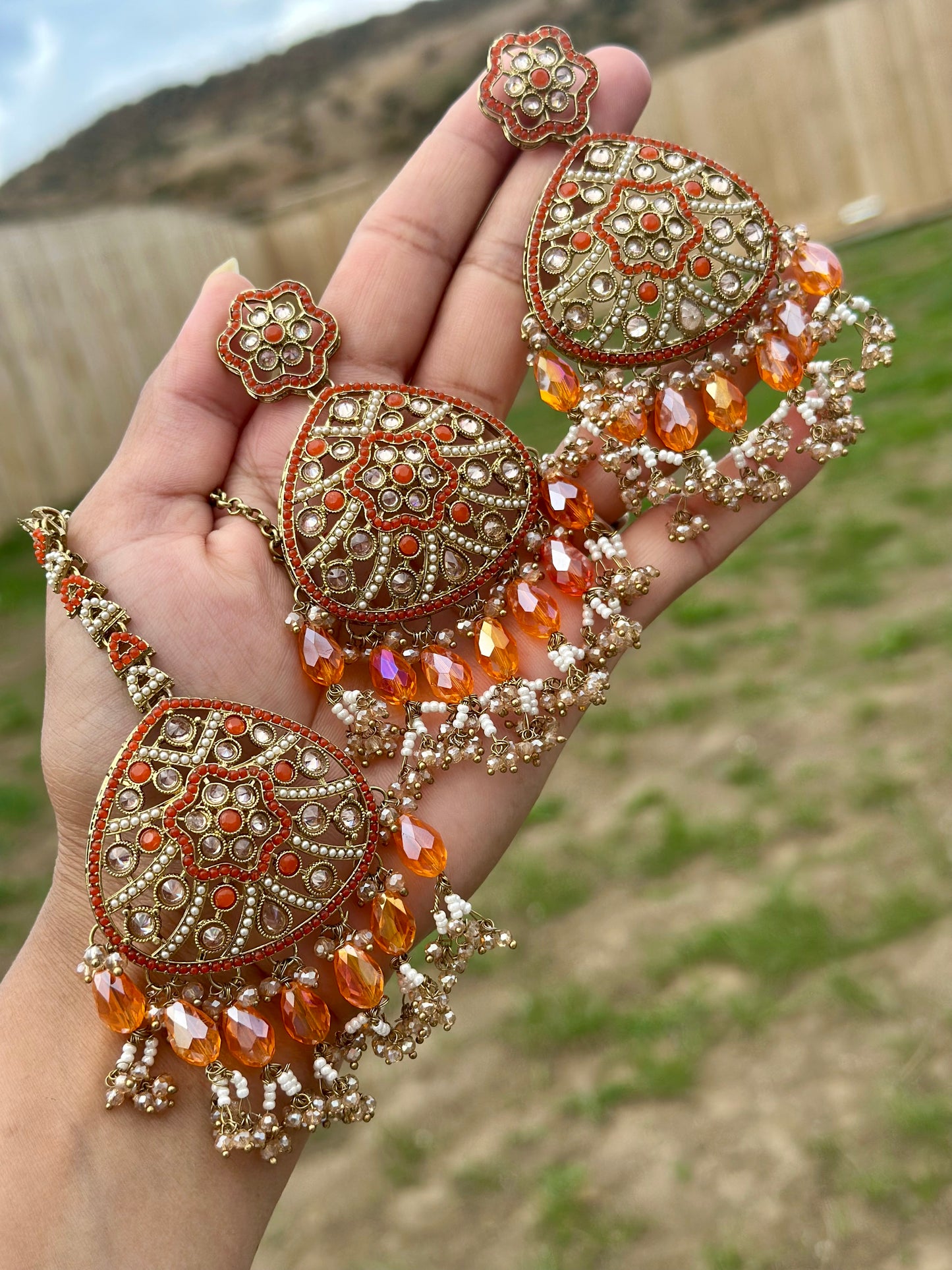 Orange colour earrings with tikka - J21