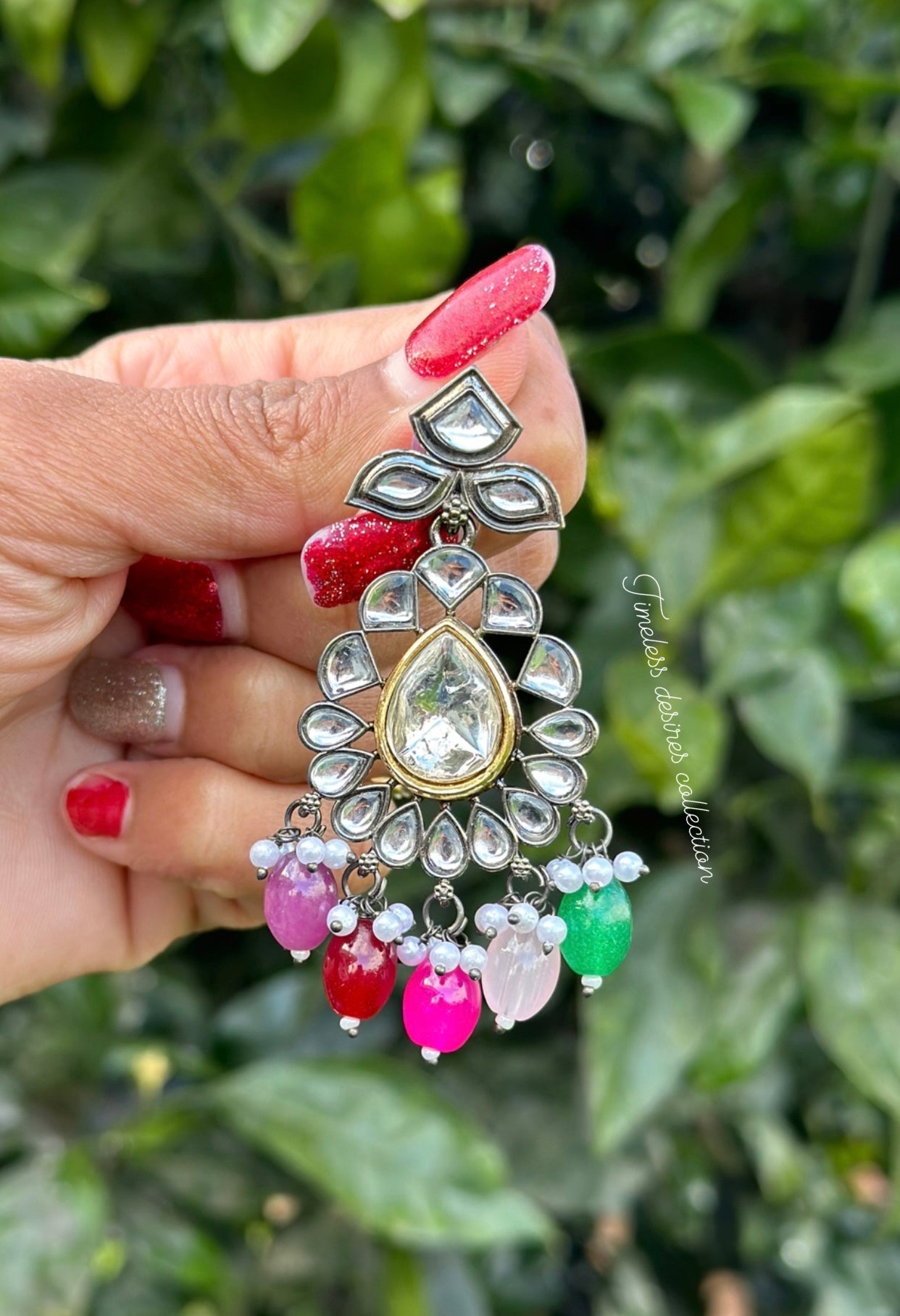 Multi coloured earrings in Kundan