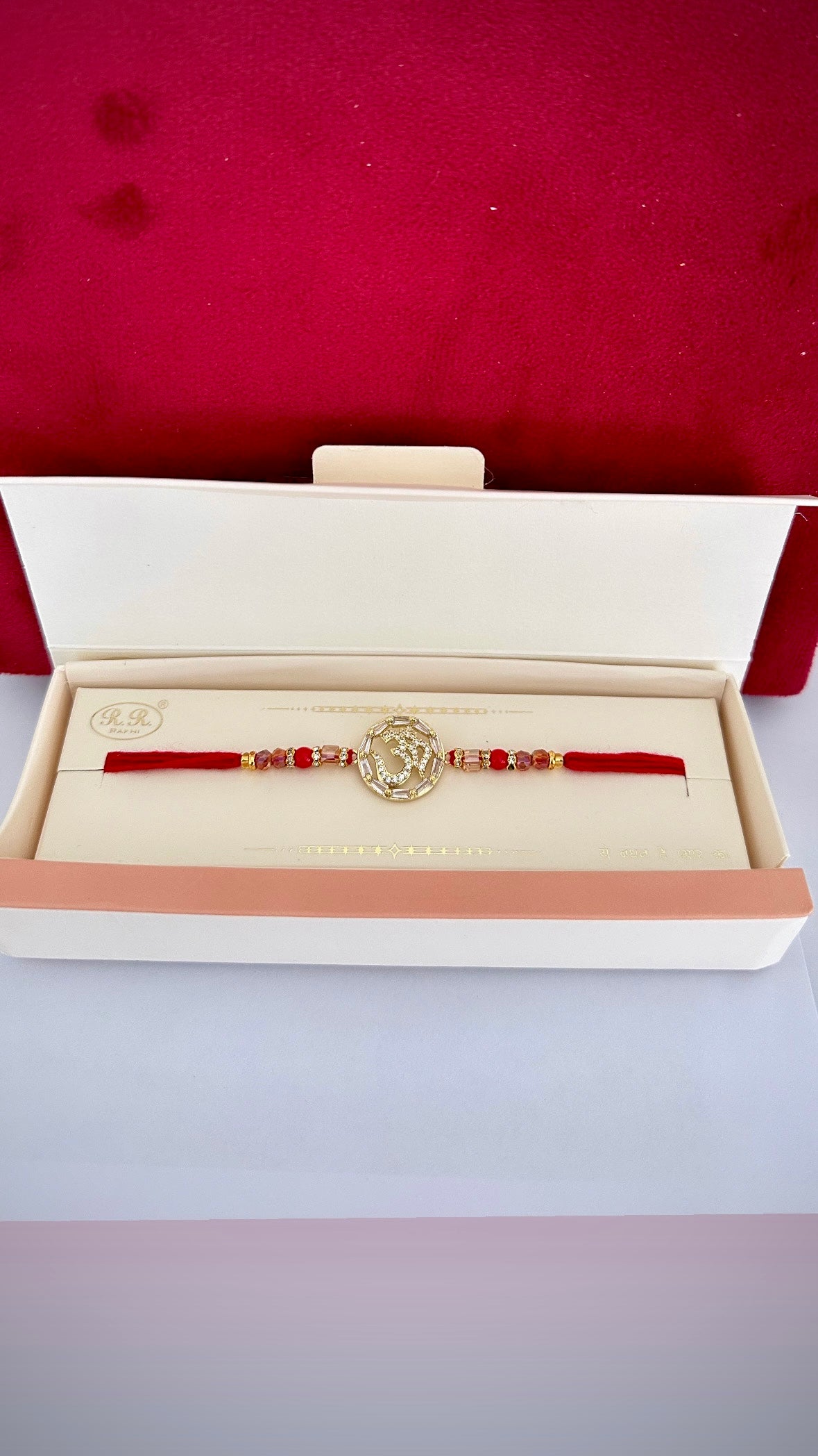 OM Rakhi / Rakhdi box in American Diamond- Code A11