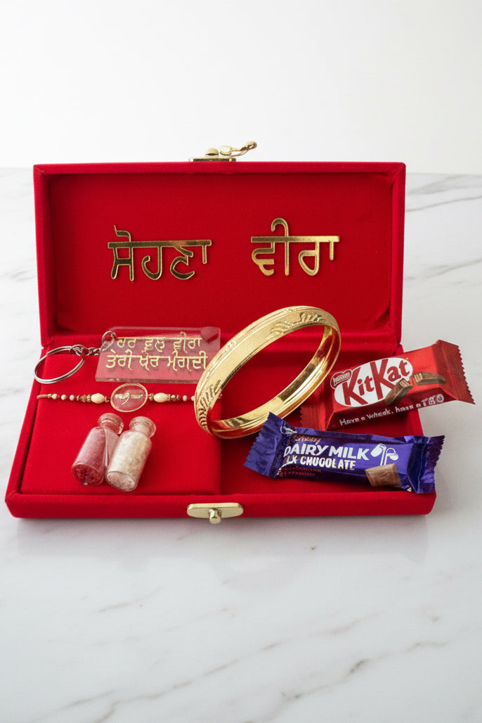 Premium Big Hamper box for brother - Includes ( Assorted Rakhi, Customised Key chain, chocolates,  Gold look Kada)- Hamper Box 3