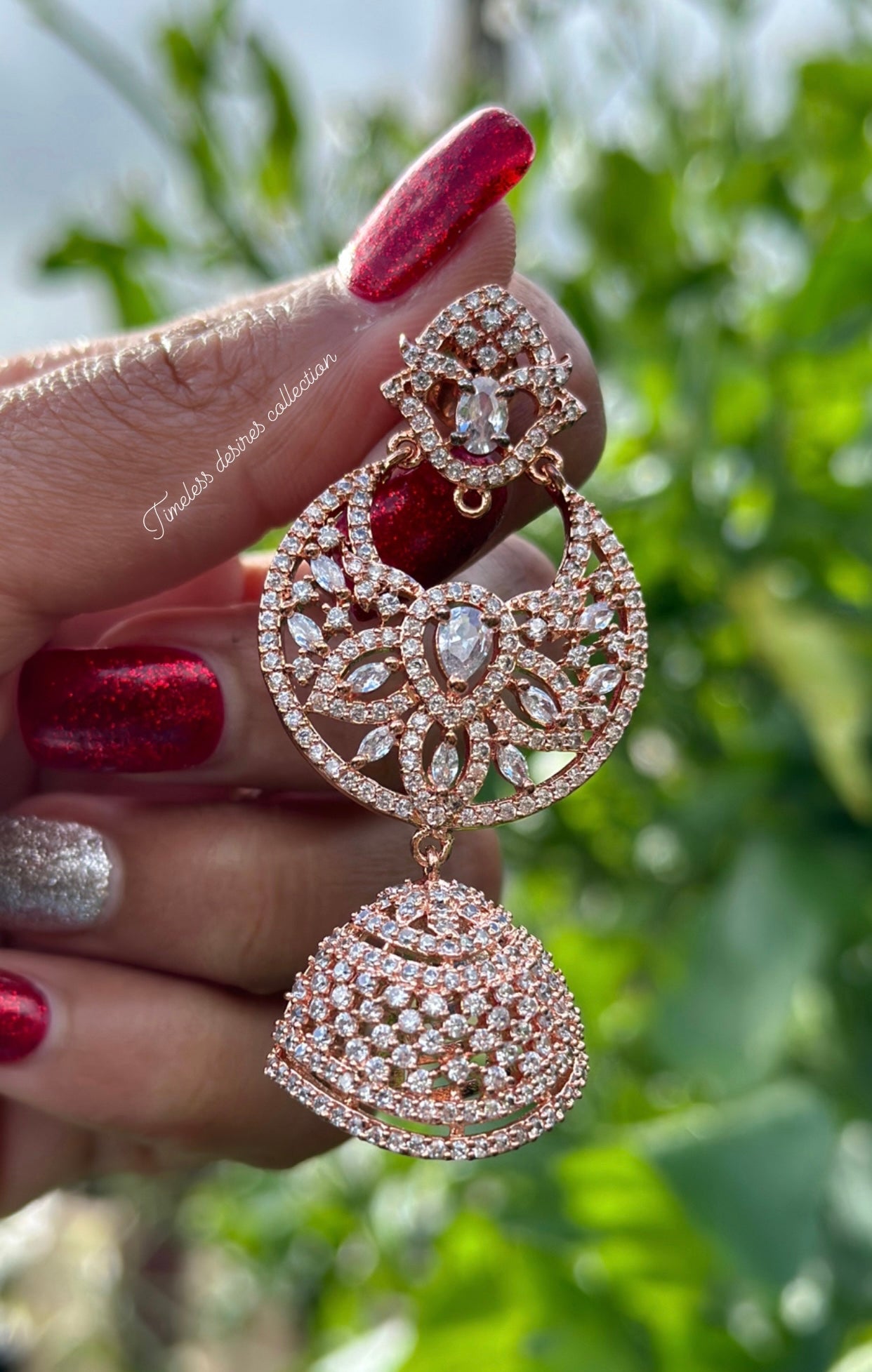 American diamond Jhumka earrings in rose golden polish