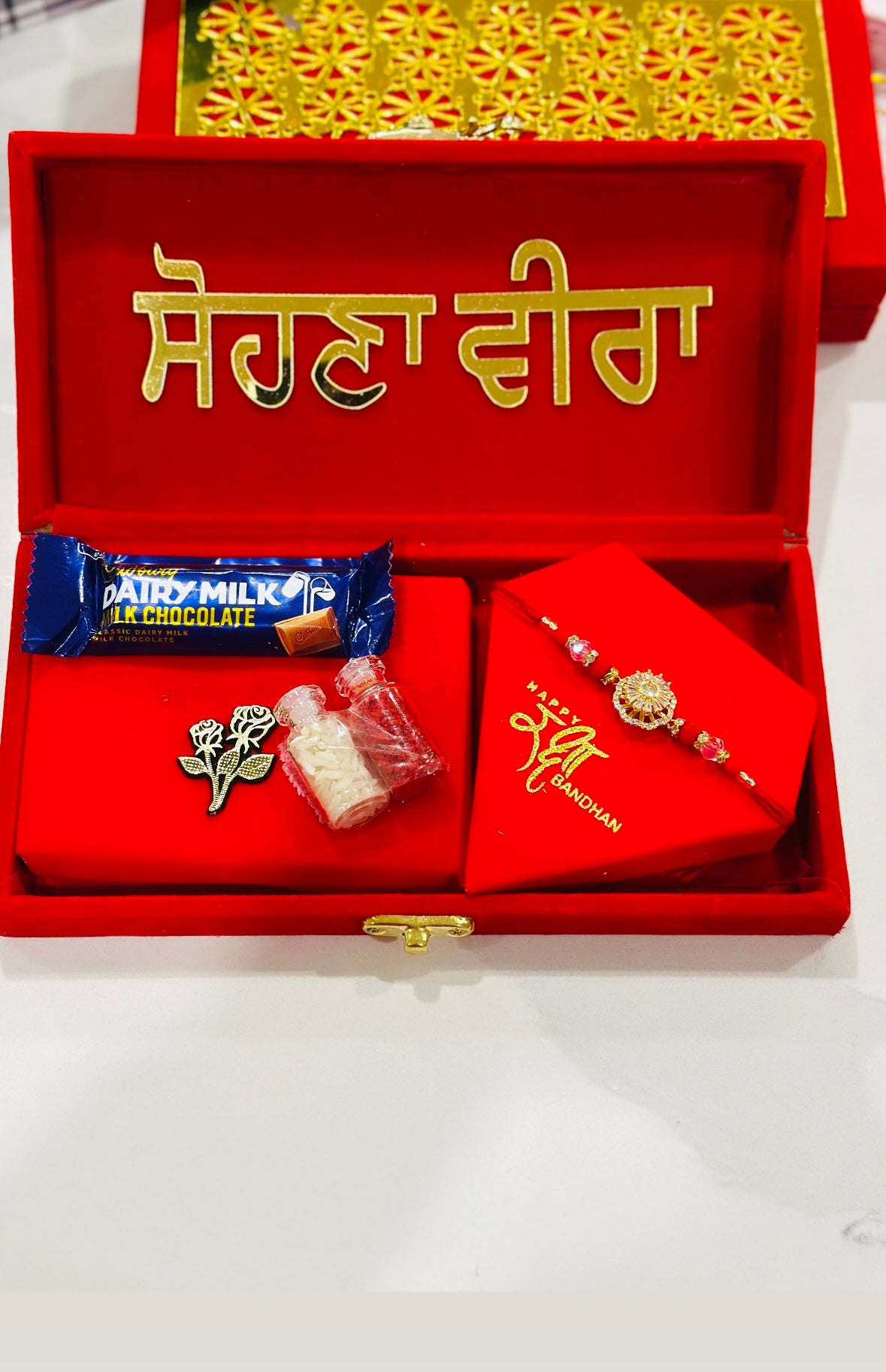 Sohna Veera Rakhi / Rakhdi gift hamper box - premium rakhdi ( Assorted Choc/Rakhi/Box Designs )