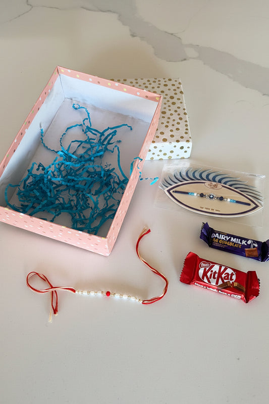 Hamper box for brother - includes : box , rakhi pack  , thread rakhi and chocolate’s