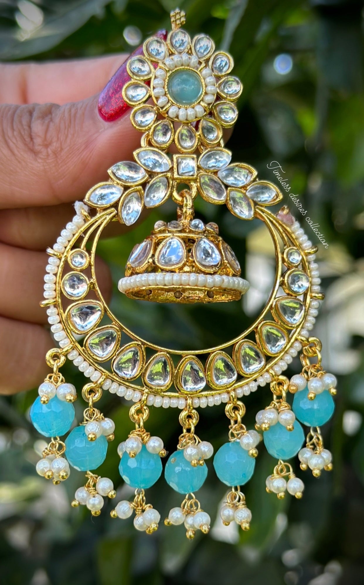 Sky blue Jhumka drop earrings in Kundan