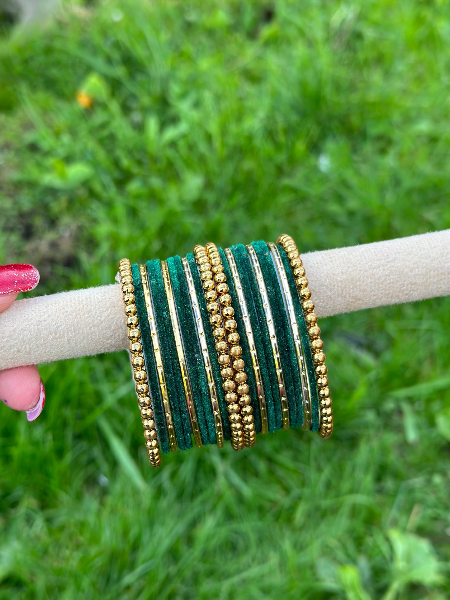 Green velvet bangles set with golden beaded kangan’s