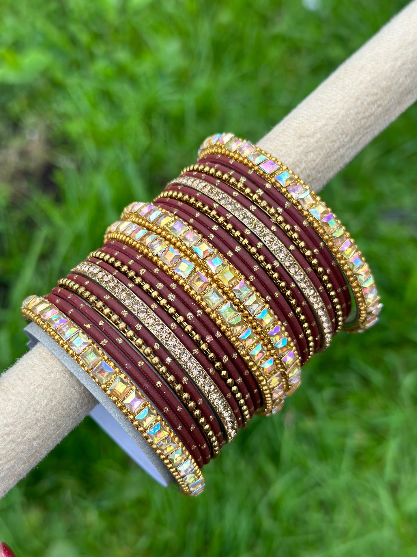Maroon colour bangles with shiny golden kangan’s ( set of both hands )