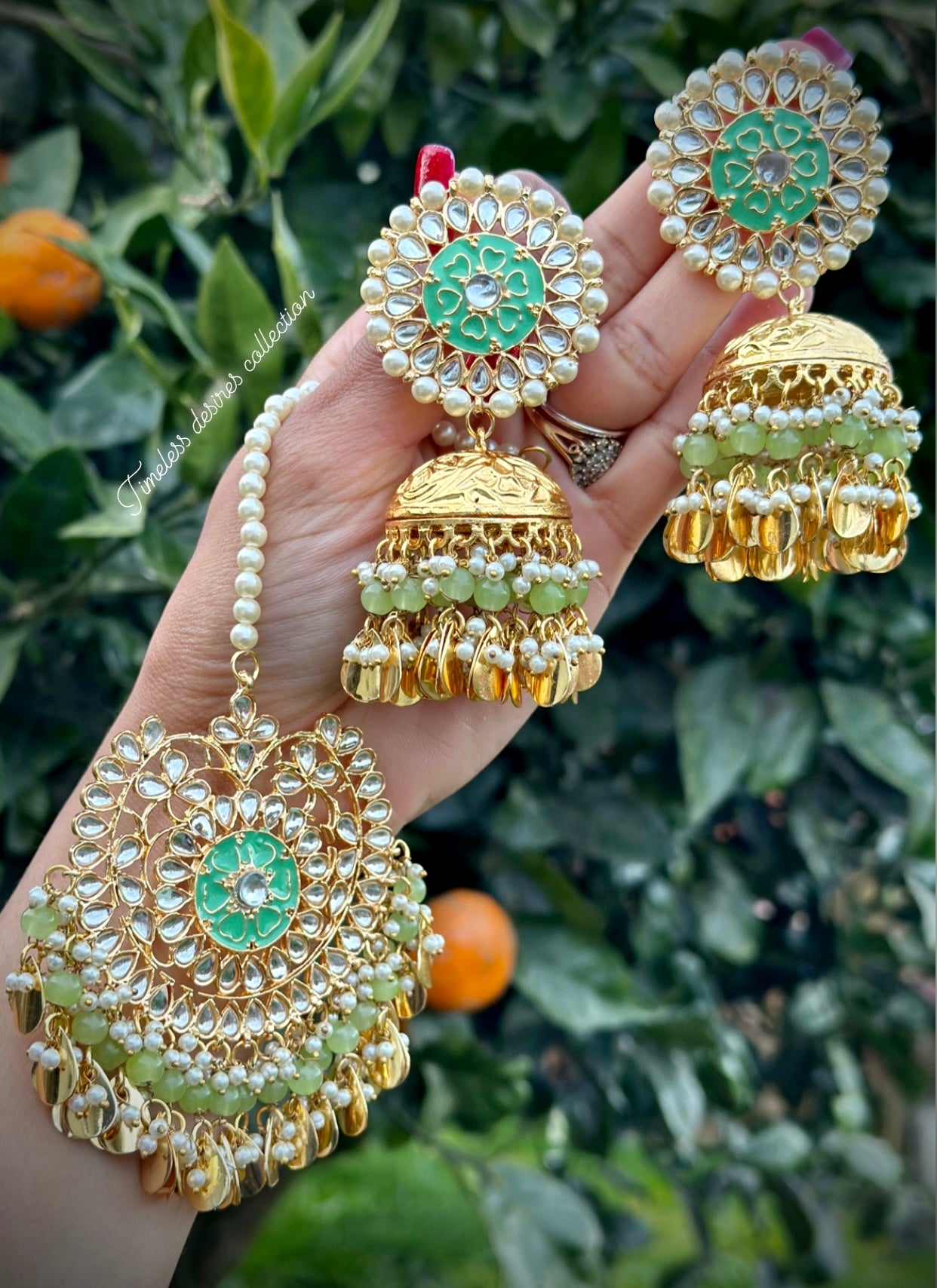 Mint green jhumka earrings and tikka set with pipal Patti in traditional jewellery ( Nimrat style 👌)