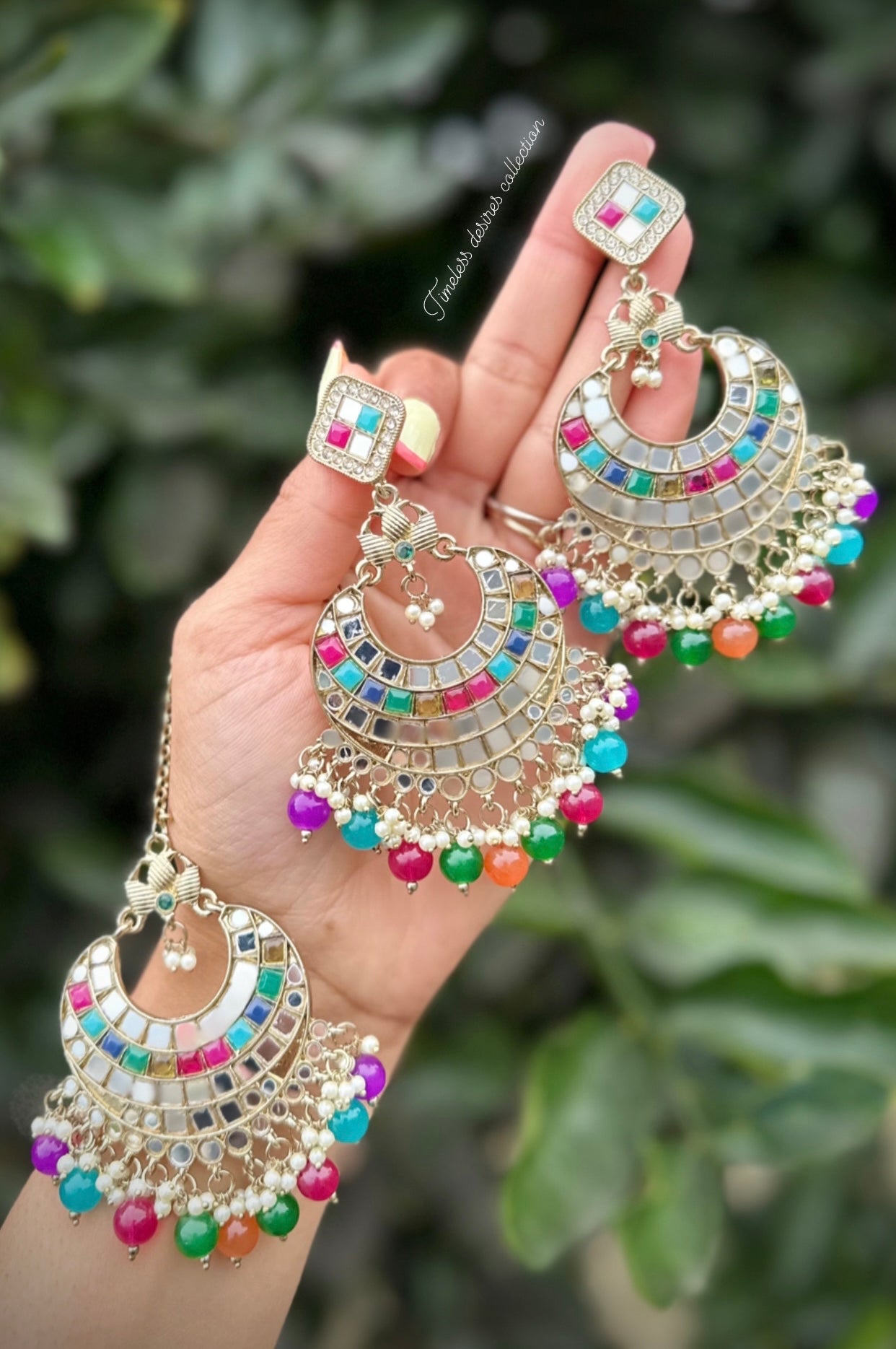 Multi coloured earrings and tikka set in mirror
