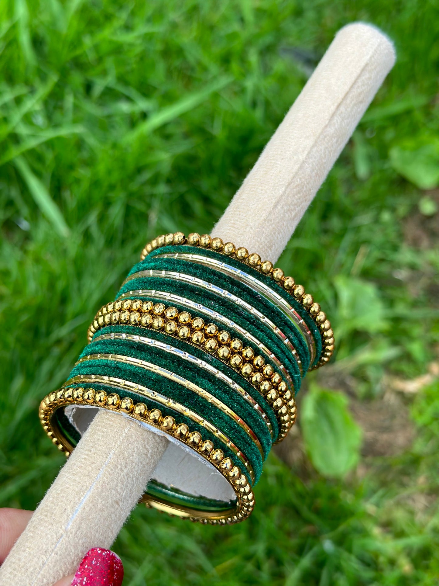 Green velvet bangles set with golden beaded kangan’s