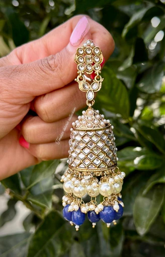 Blue pearl loaded long Jhumka earrings in Kundan