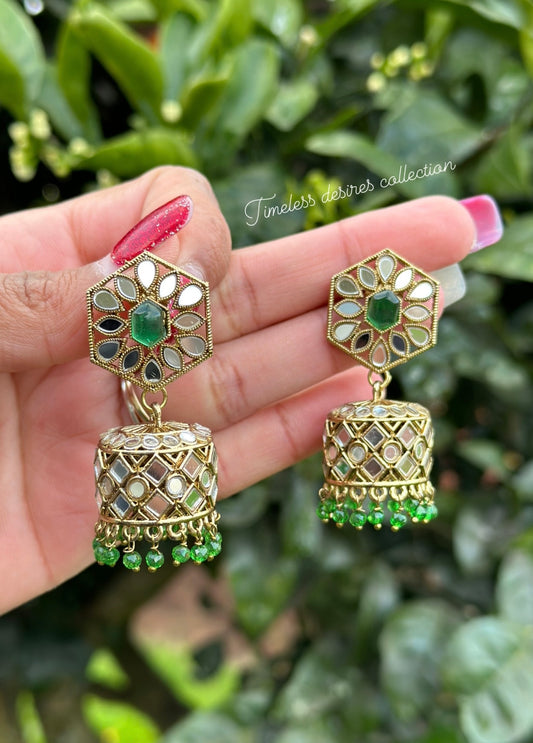 Green Jhumka earrings in mirror
