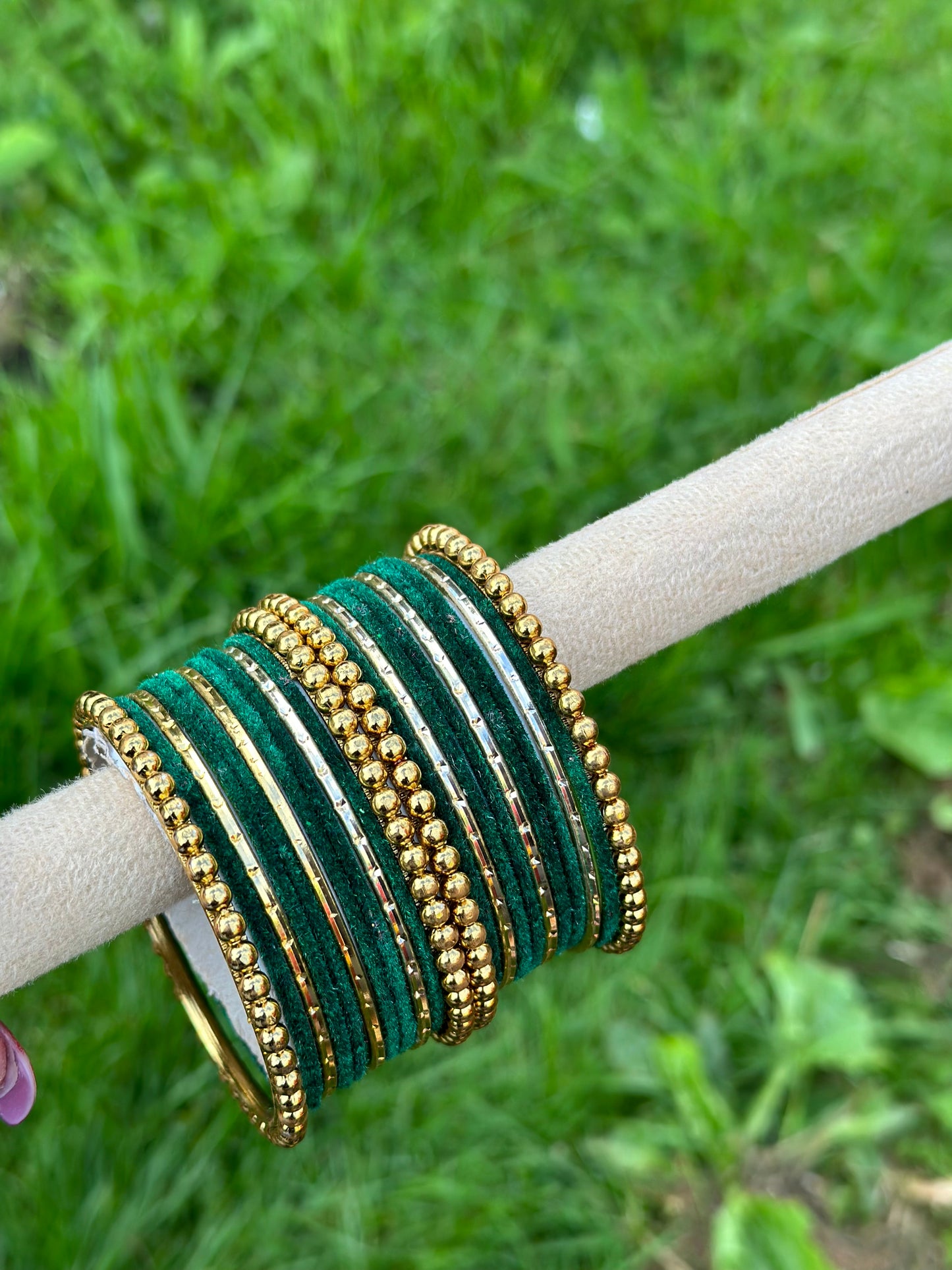 Green velvet bangles set with golden beaded kangan’s
