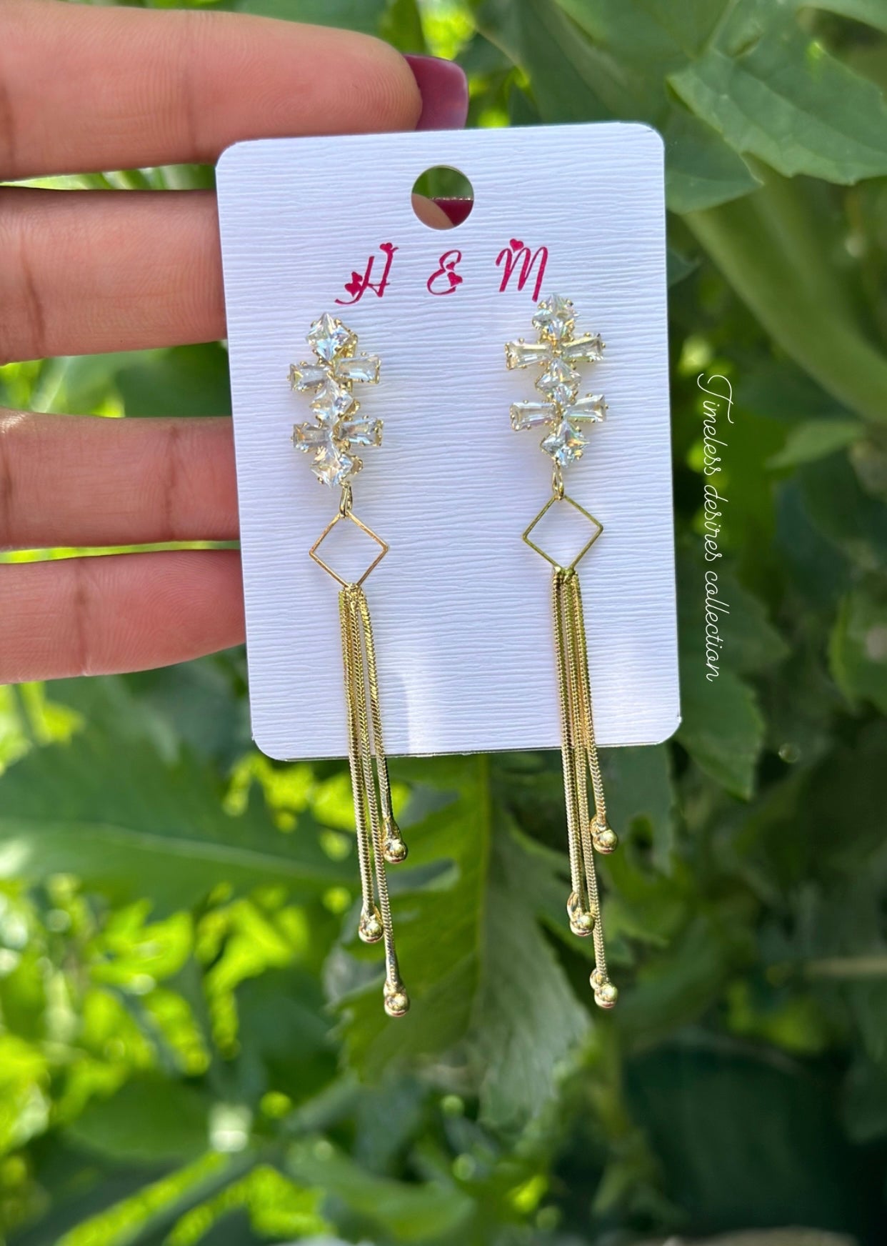 Golden hanging earrings in western style