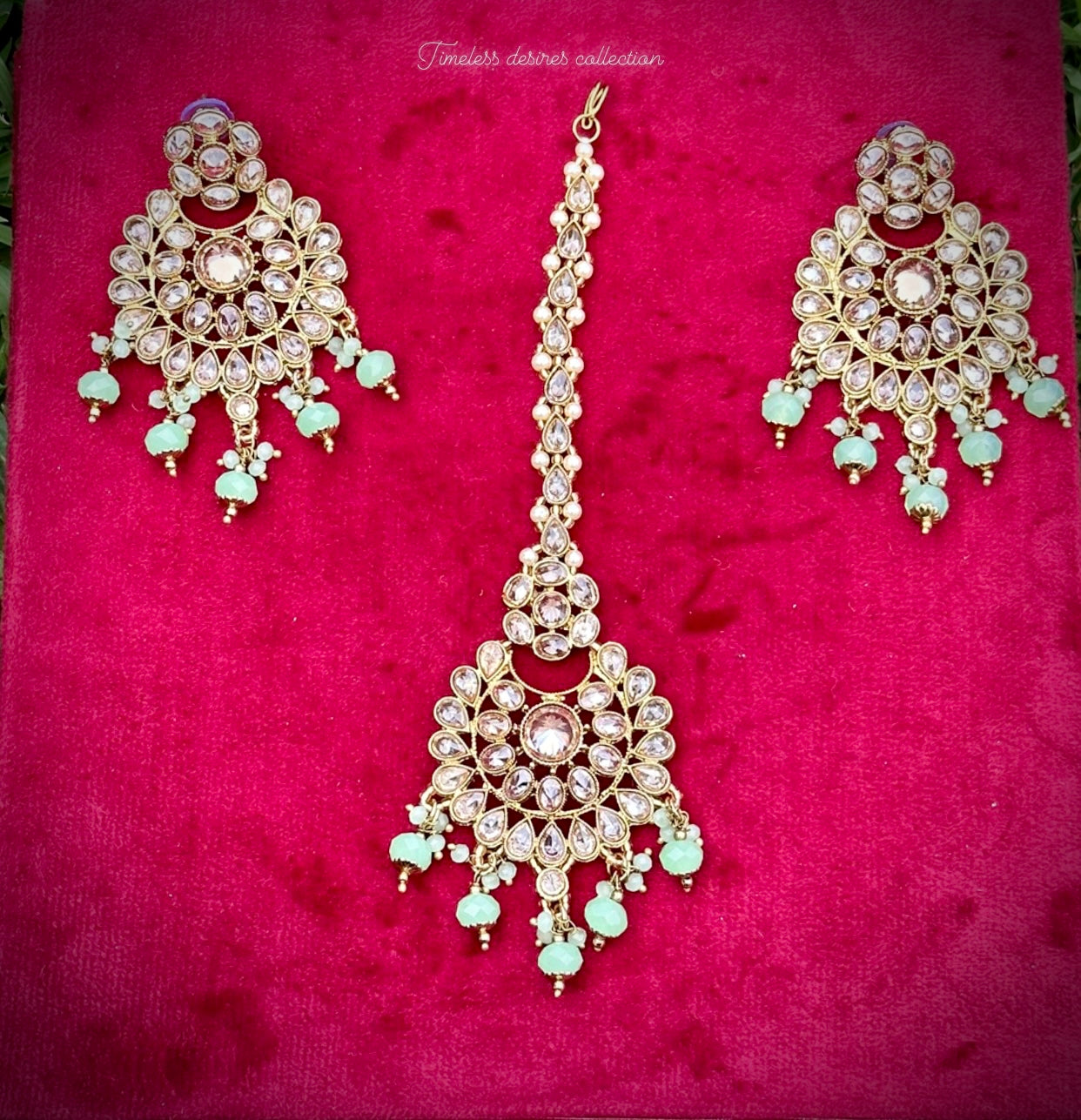 Mint  green earrings and tikka set in reverse AD ( high quality Polki )