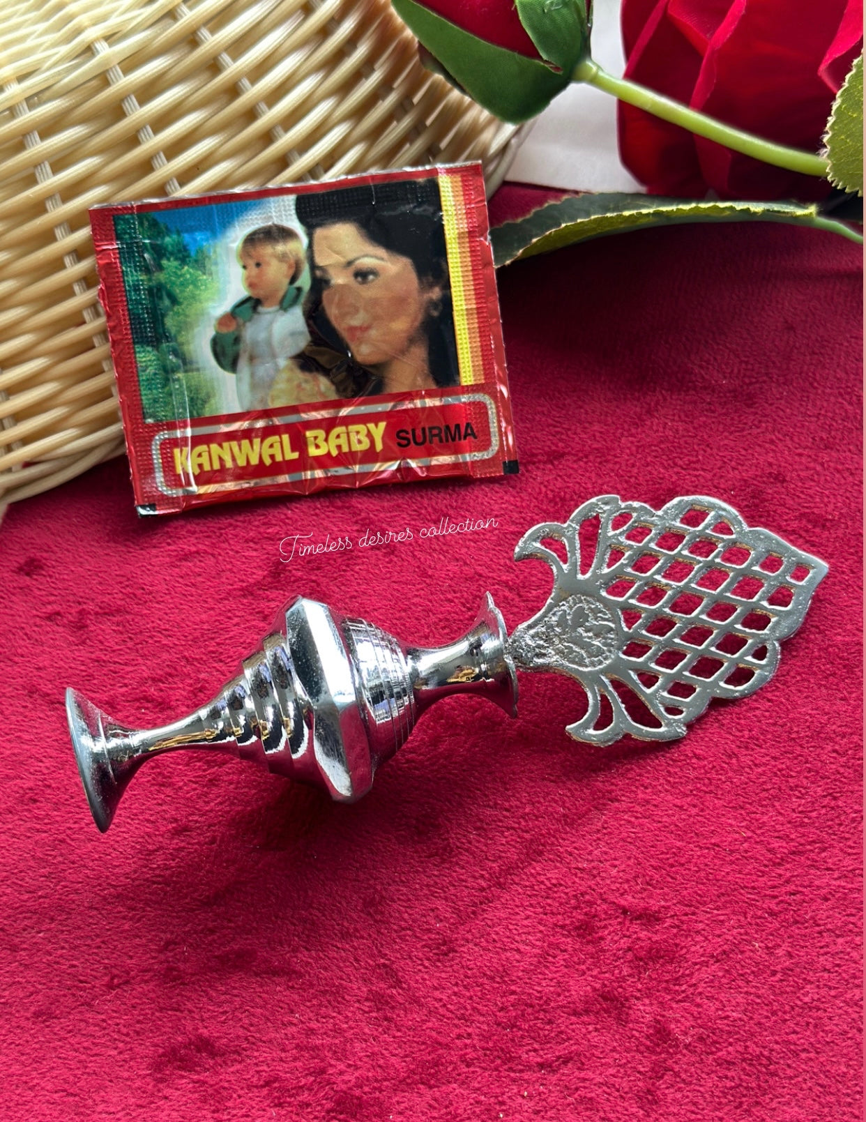 Traditional surmadani with a pack of fresh Surma filling