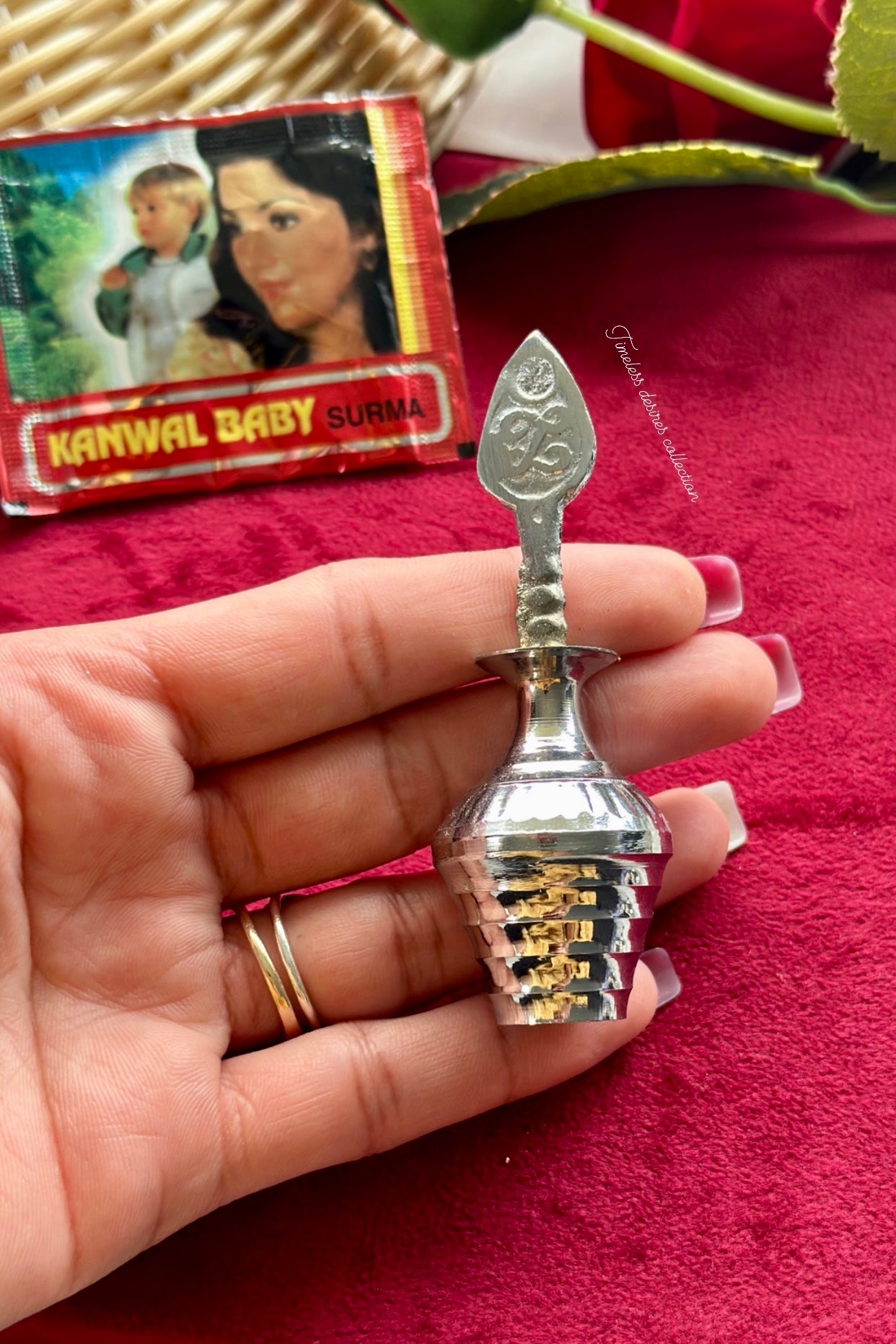 Traditional surmadani with a pack of fresh Surma filling
