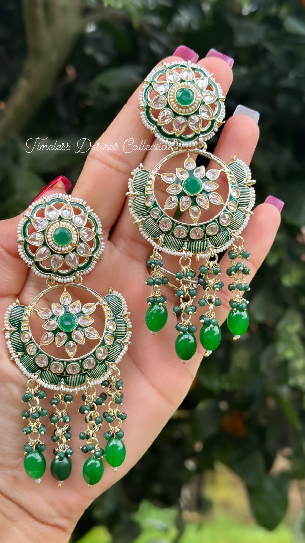 Green pearl loaded earrings in meenakari