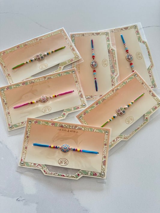 Assorted Rakhi / Rakhdi packs in Meenakari  ( per pack )