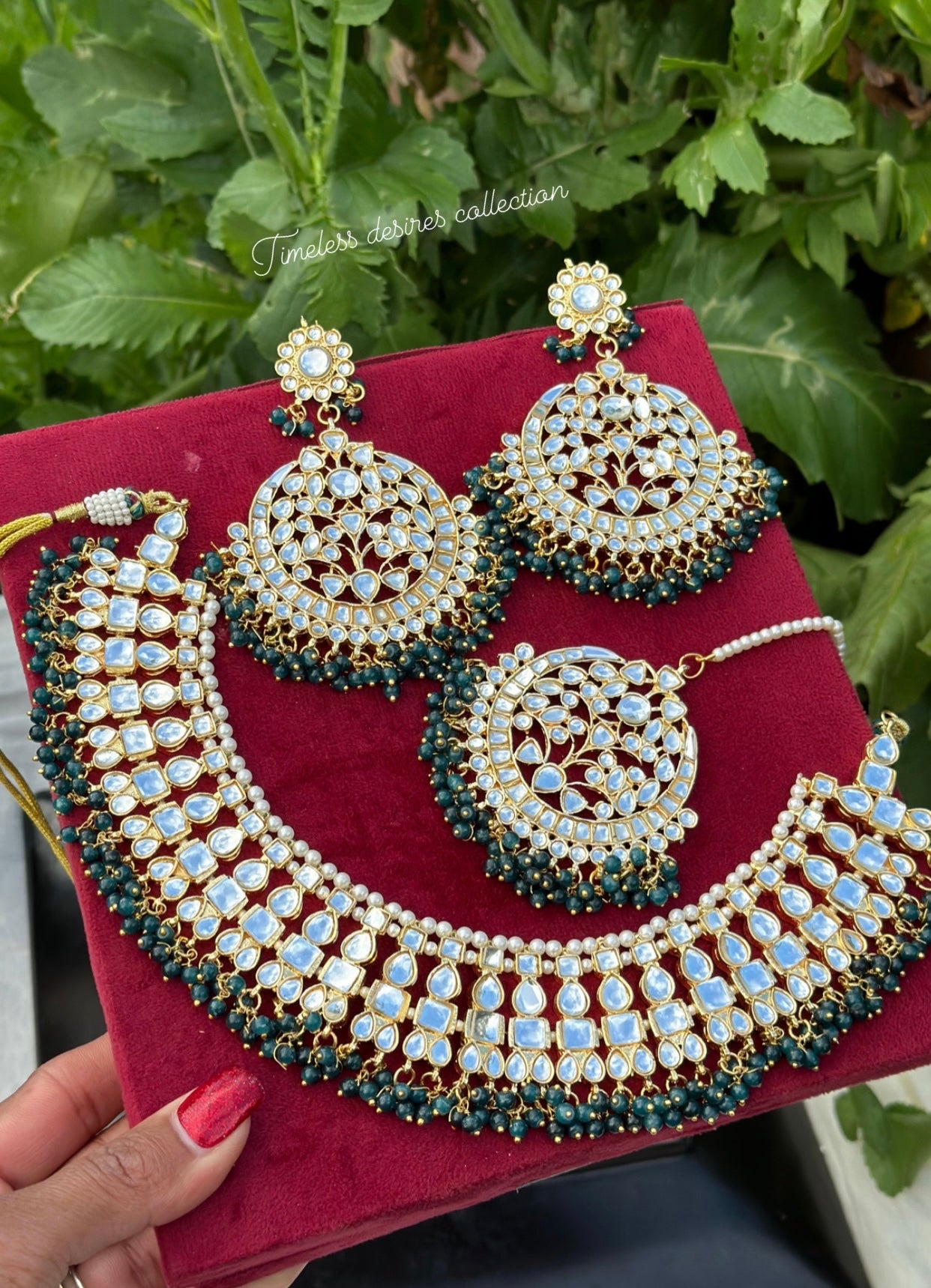 Peacock green Necklace / choker set in Kundan with oversized earrings and tikka ( high quality )