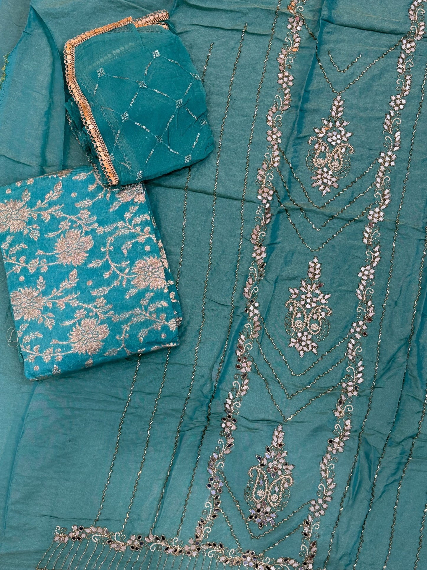Unstitched handwork Suit - shirt: shimmer silk , bottom : Banarsi , Duppata : chiffon ( colour - firozi )