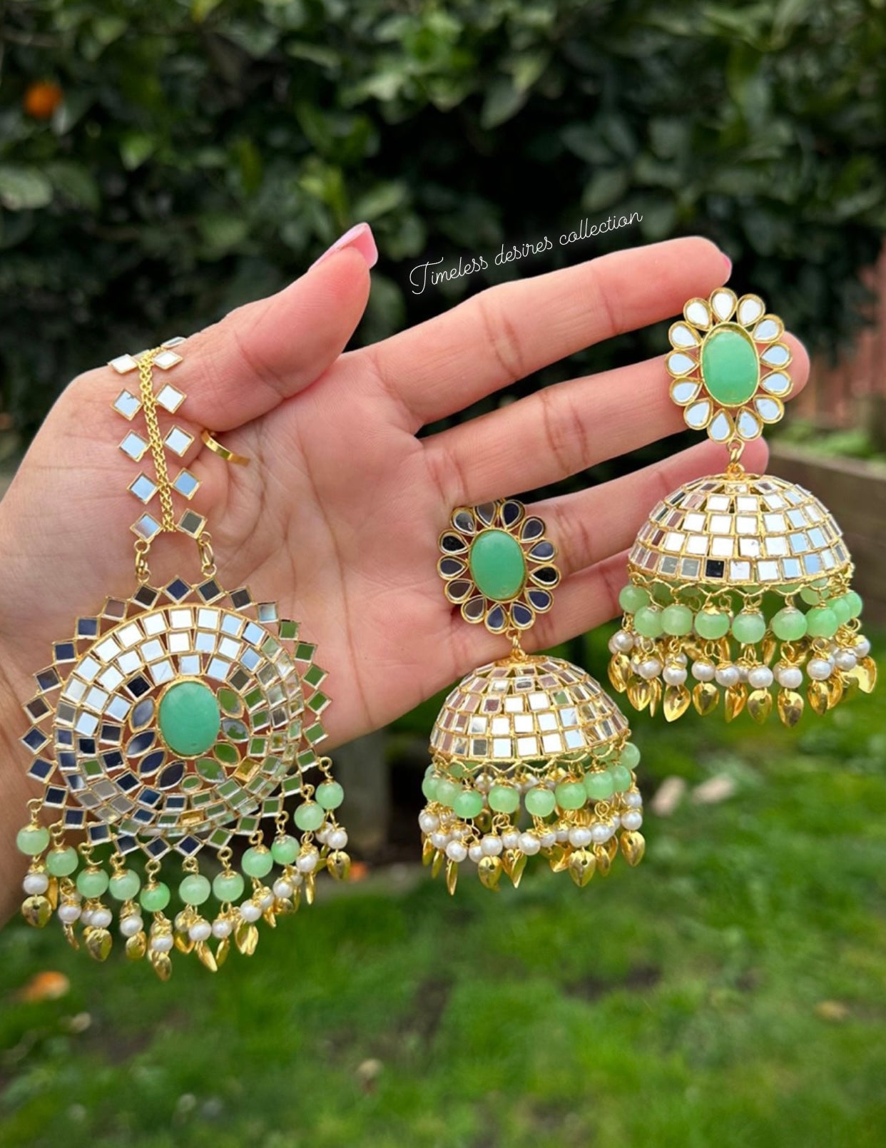 Mint green Jhumka earrings with oversized tikka in mirror with pipal patti