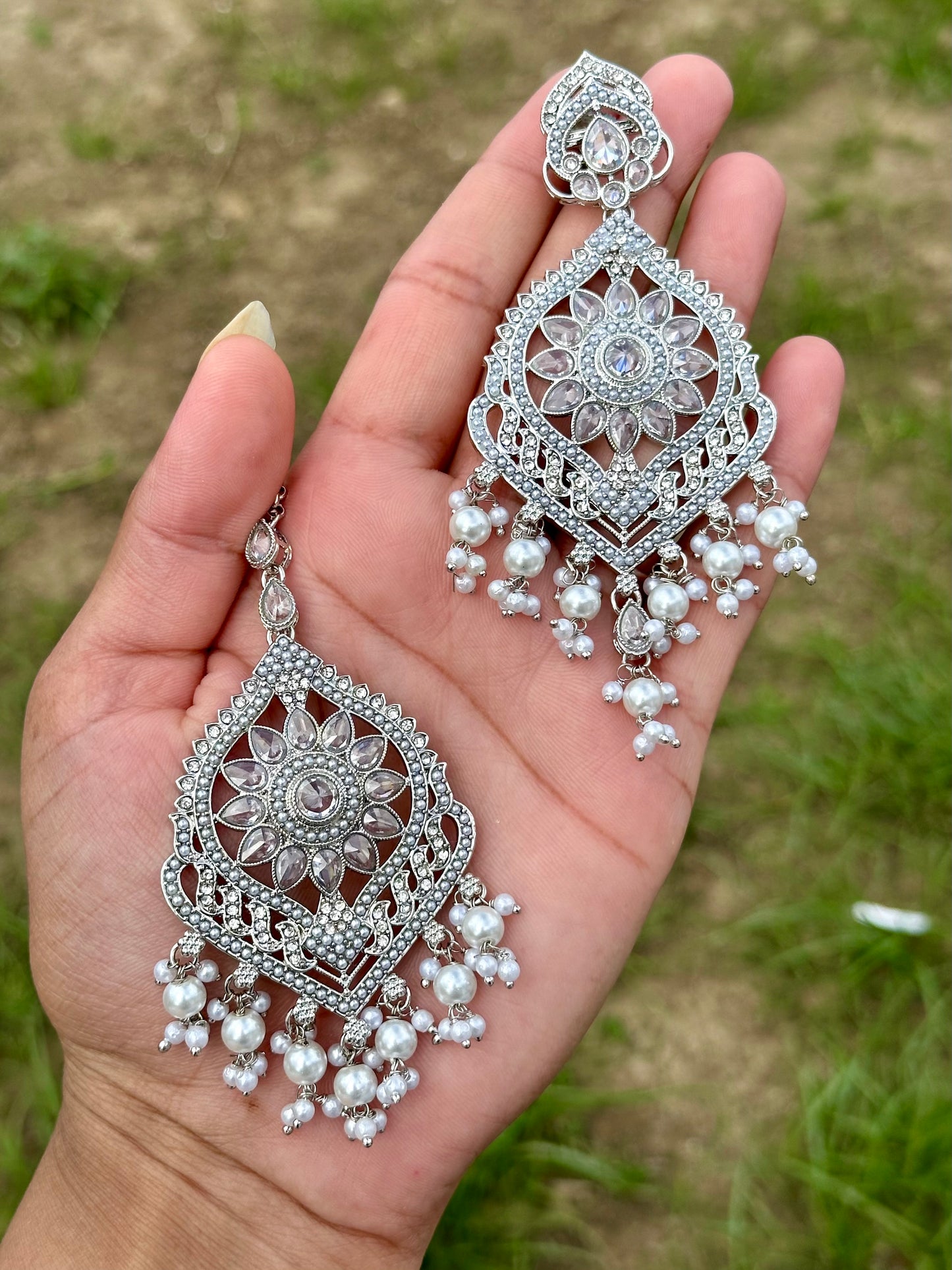 Silver earrings with tikka- J10